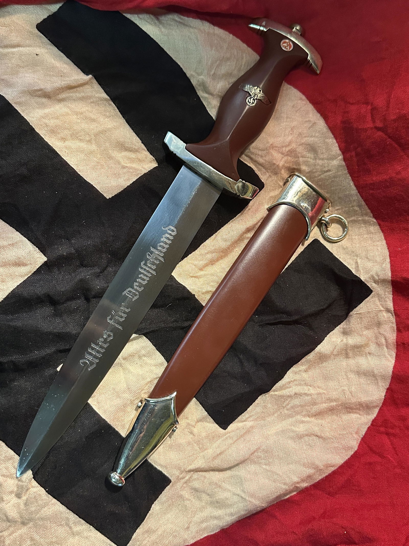 RARE 1938 SA DAGGER WITH SCABBARD BY BOKER SOLINGEN: RARE 1938 SA DAGGER WITH SCABBARD BY BOKER SOLINGEN. A RARE FIND. IT IS IN MINT OVERALL SHAPE AND CONDITION WITH A BEAUTIFUL OVERALL PATINA. SHOWS SIGNS OF USE AND MIGHT'VE BEEN SHARPENED AT ONE POINT