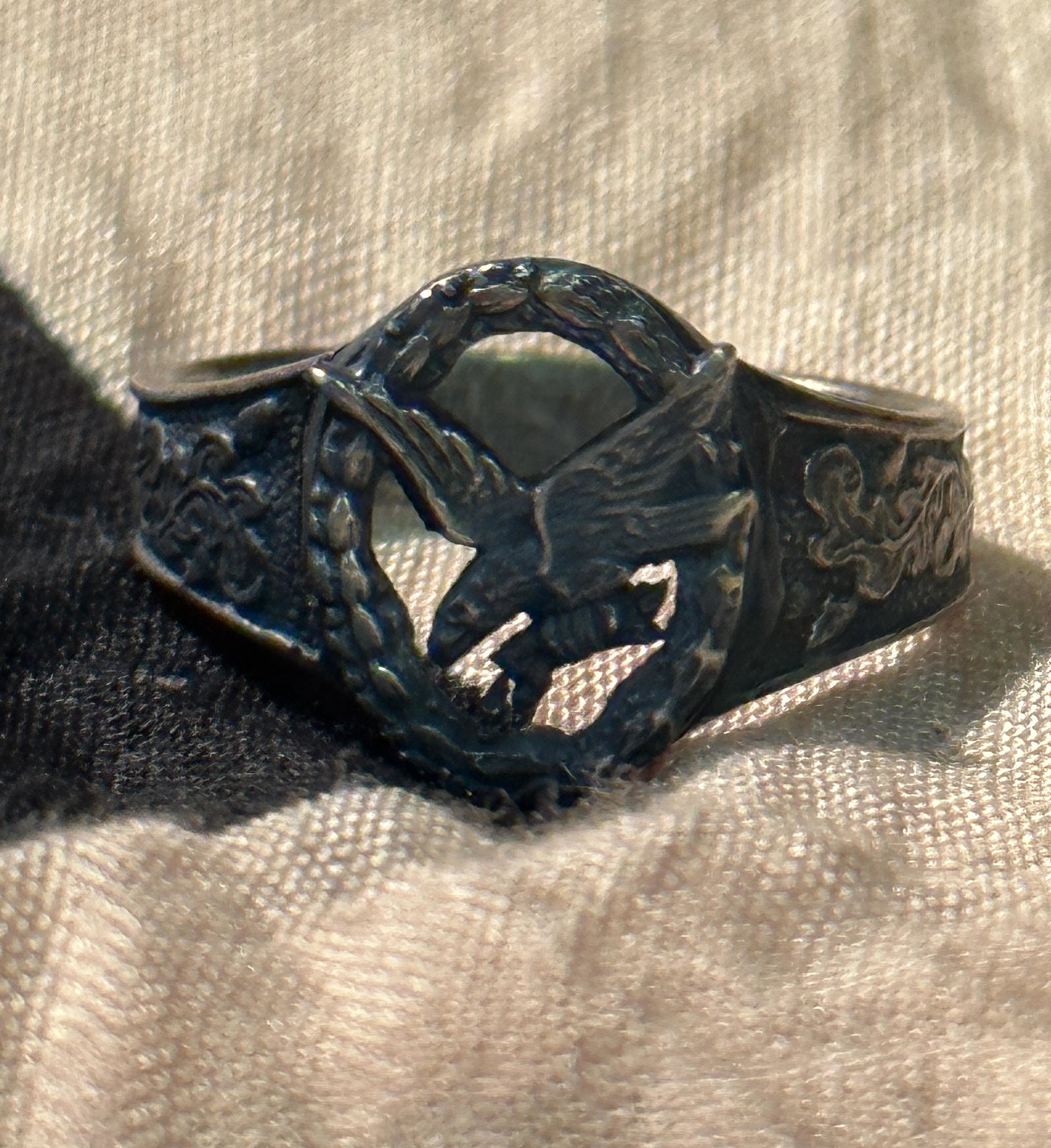 WW2 GERMAN PARATROOPER PILOT'S 800 SILVER RING: WW2 GERMAN PARATROOPER PILOT'S 800 SILVER RING. A VERY RARE FIND. IT IS IN MINT OVERALL SHAPE AND CONDITION WITH A BEAUTIFUL OVERALL PATINA. SHOWS GOOD WEAR AND USE. A WELL MADE ANTIQUE GERMAN ARTIFAC