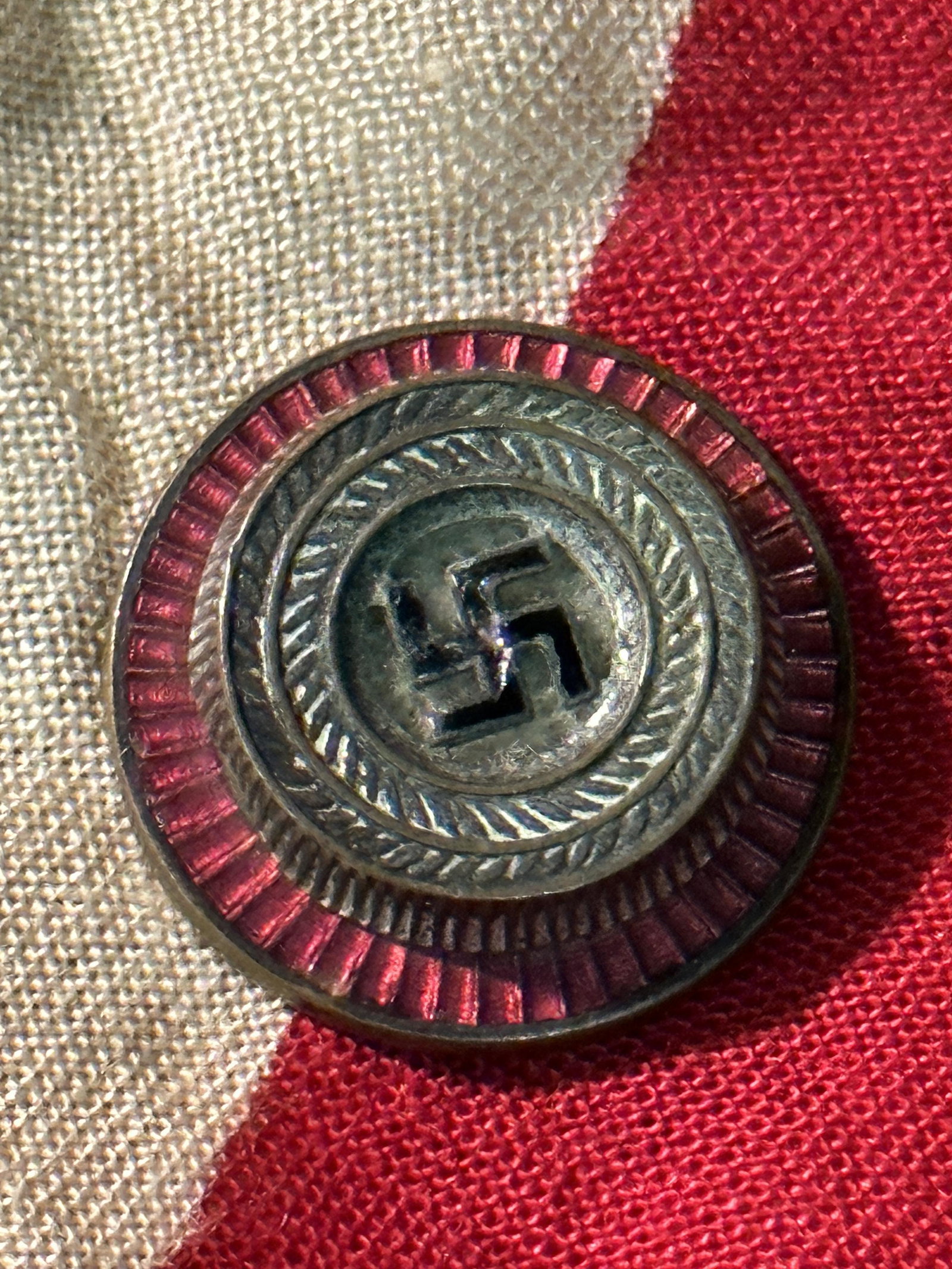 WW2 GERMAN NSDAP POLITICAL VISOR CAP COCKADE: WW2 GERMAN NSDAP POLITICAL VISOR CAP COCKADE. WAS BROUGHT BACK HOME BY A VET. MARKER MARKED RZM M1/8. Officially introduced in August of 1935, the cockade was worn on the front centerband of the Polit