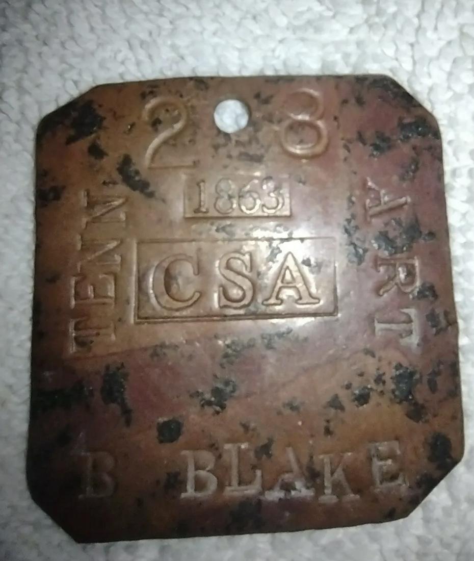 RARE CIVIL WAR CONFEDERATE TENNESSEE TAG ID'D TO BLAKE, ART: RARE CIVIL WAR CONFEDERATE TENNESSEE TAG ID'D TO BLAKE, ART. A VERY RARE FIND. IT IS IN MINT OVERALL SHAPE AND CONDITION WITH A BEAUTIFUL OVERALL PATINA. SHOWS GOOD WEAR AND HEAVY USE. BELONGED TO BLA