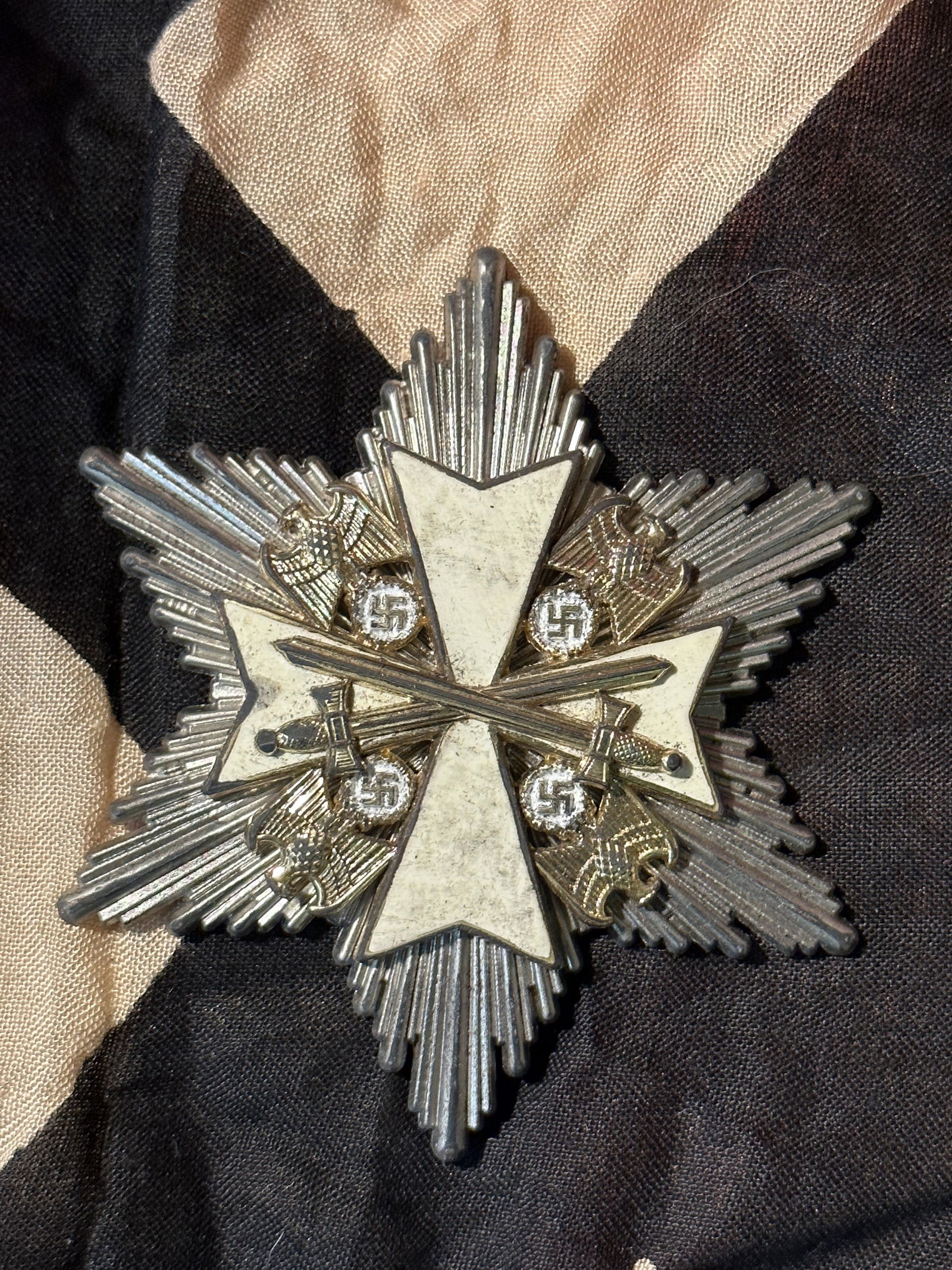 RARE WW2 GERMAN ORDER OF THE EAGLE WITH SWORDS 2ND CLASS: RARE WW2 GERMAN ORDER OF THE EAGLE WITH SWORDS 2ND CLASS. MARKED WITH A SERIAL NUMBER ON THE SPANGE. SHOWS GOOD WEAR AND HEAVY USE. HAS A NICE PATINA THROUGHOUT. PLEASE VIEW ALL DETAILED PICTURES. A R