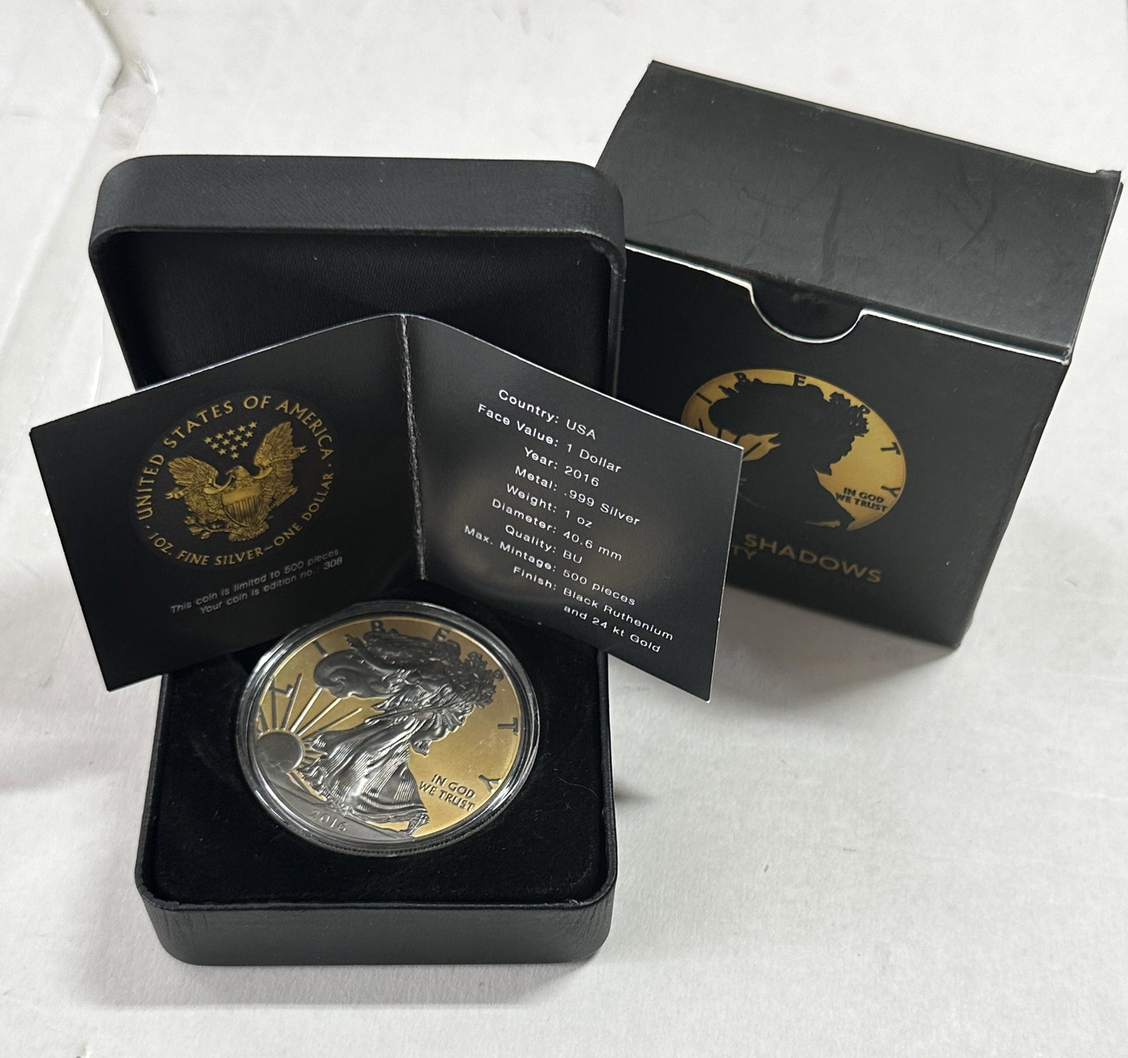 PROOF 2016 $1 WALKING LIBERTY SILVER DOLLAR - BLACK RUTHENIUM AND 24K GOLD: PROOF 2016 $1 WALKING LIBERTY SILVER DOLLAR - BLACK RUTHENIUM AND 24K GOLD. COMES WITH THE ORIGINAL BOX AND CASE. A GREAT ADDITION TO YOUR COLLECTION.