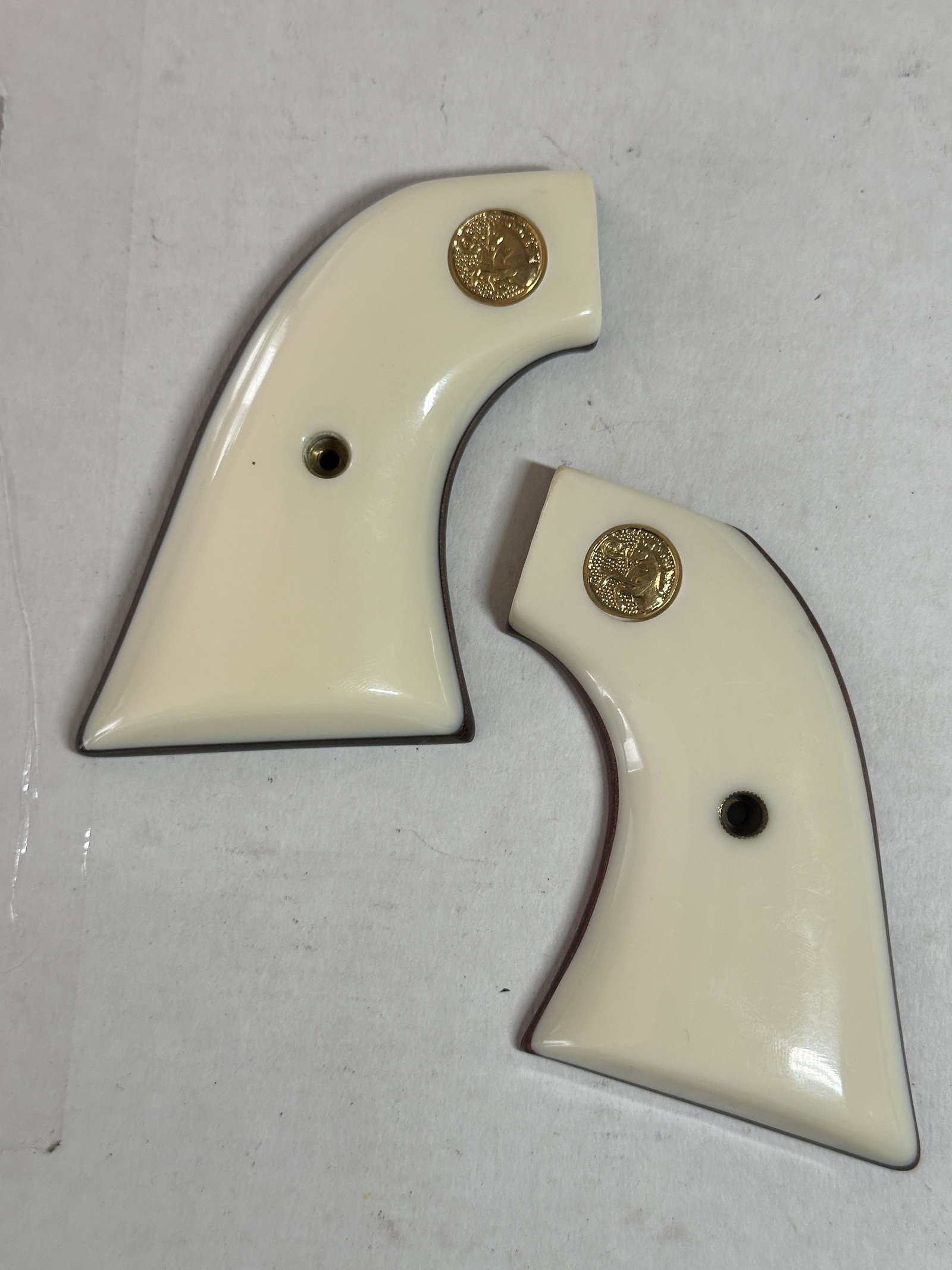 CUSTOM SINGLE ACTION COLT ARMY HAND GRIPS FOR REVOLVER: CUSTOM SINGLE ACTION COLT ARMY HAND GRIPS FOR REVOLVER. A RARE FIND. THEY ARE IN MINT OVERALL SHAPE AND CONDITION. A GREAT ADDITION TO YOUR COLLECTION.