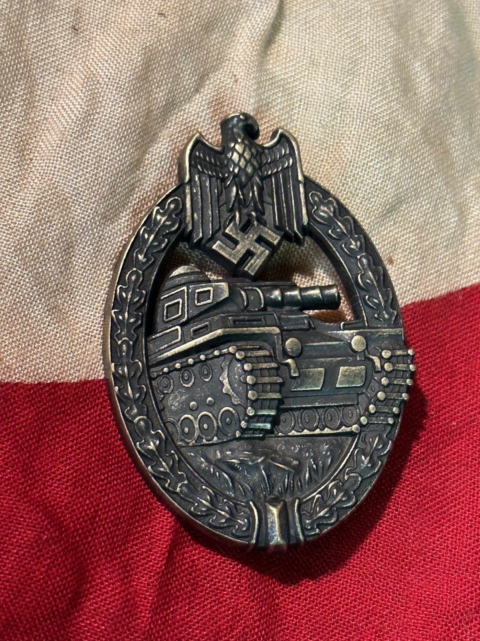 WW2 GERMAN ARMY PANZER BRONZE ASSAULT BADGE BY DH: WW2 GERMAN ARMY PANZER BRONZE ASSAULT BADGE BY DH. A RARE FIND. The Bronze Panzer Badge recognizes the crews of armored vehicles other than tanks. This Army Panzer Assault Badge in Bronze was awarded 