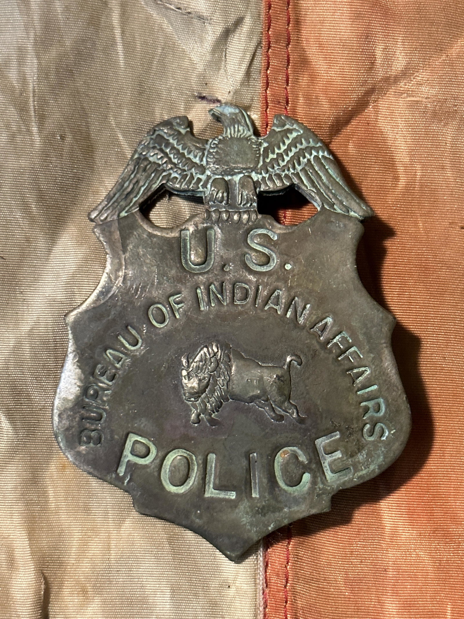 ANTIQUE U.S. BUREAU OF INDIAN AFFAIRS POLICE BADGE: ANTIQUE U.S. BUREAU OF INDIAN AFFAIRS POLICE BADGE. A RARE FIND. IT IS IN MINT OVERALL SHAPE AND CONDITION WITH A BEAUTIFUL OVERALL PATINA. SHOWS GOOD WEAR AND USE. A GREAT FIND AND AN EXCELLENT ADDIT