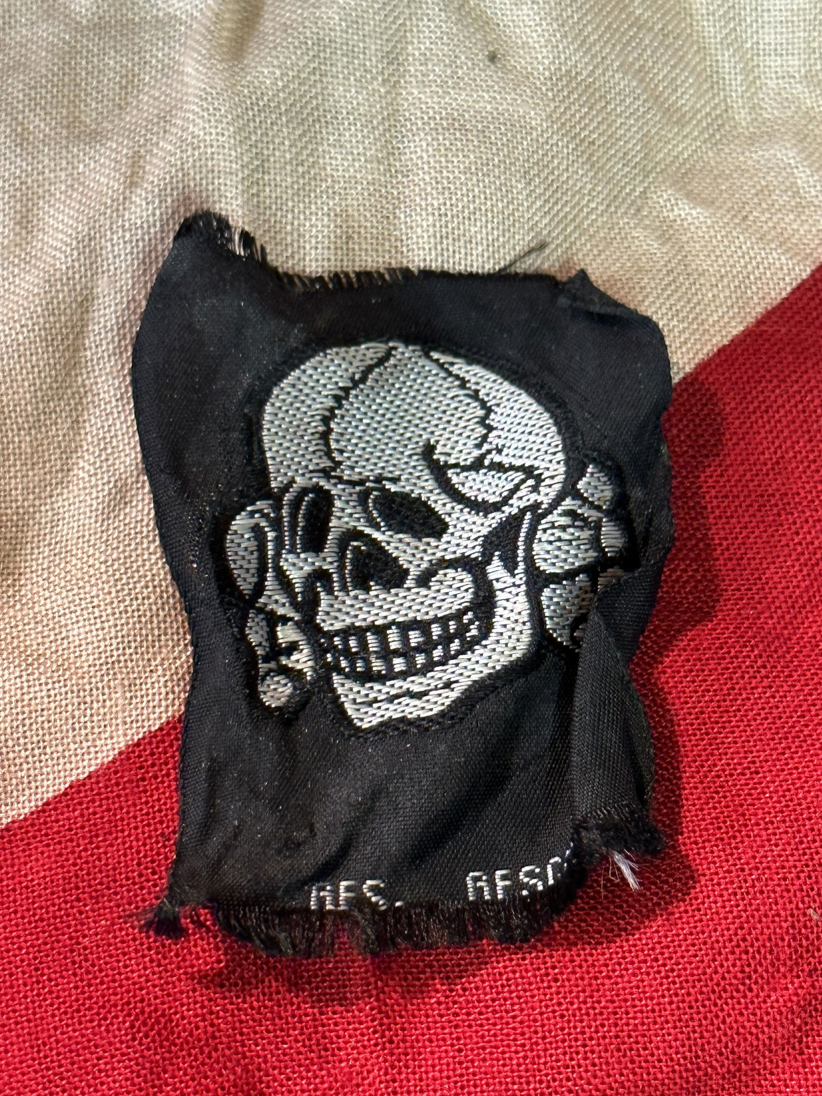 WW2 GERMAN TOTENKOPF SS CAP SKULL BEVO STYLE HAT BADGE EM GREY MARKED GES. GESCH.: WW2 GERMAN TOTENKOPF SS CAP SKULL BEVO STYLE HAT BADGE EM GREY MARKED GES. GESCH. A RARE FIND. IT IS IN MINT OVERALL SHAPE AND CONDITION WITH A BEAUTIFUL OVERALL PATINA. SHOWS GOOD WEAR AND USE. PLEAS