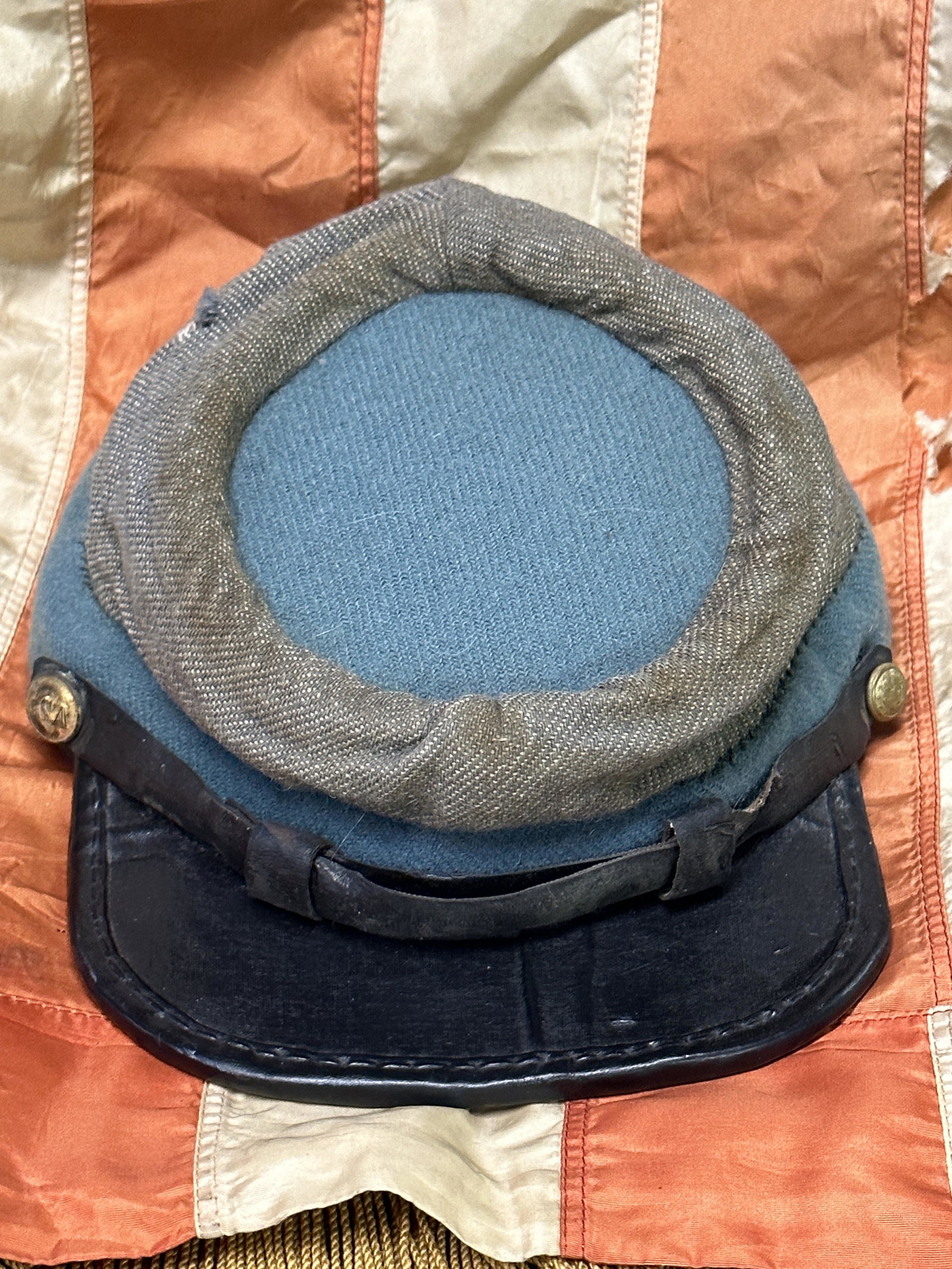 ULTRA RARE CIVIL WAR CONFEDERATE REBEL WARRIOR KEPI HAT CAP WITH CONFEDERATE BUTTONS: ULTRA RARE CIVIL WAR CONFEDERATE REBEL WARRIOR KEPI HAT CAP WITH CONFEDERATE BUTTONS. A VERY RARE FIND. IT IS IN MINT OVERALL SHAPE AND CONDITION WITH A BEAUTIFUL OVERALL PATINA. HAS A GREAT LOOK TO I