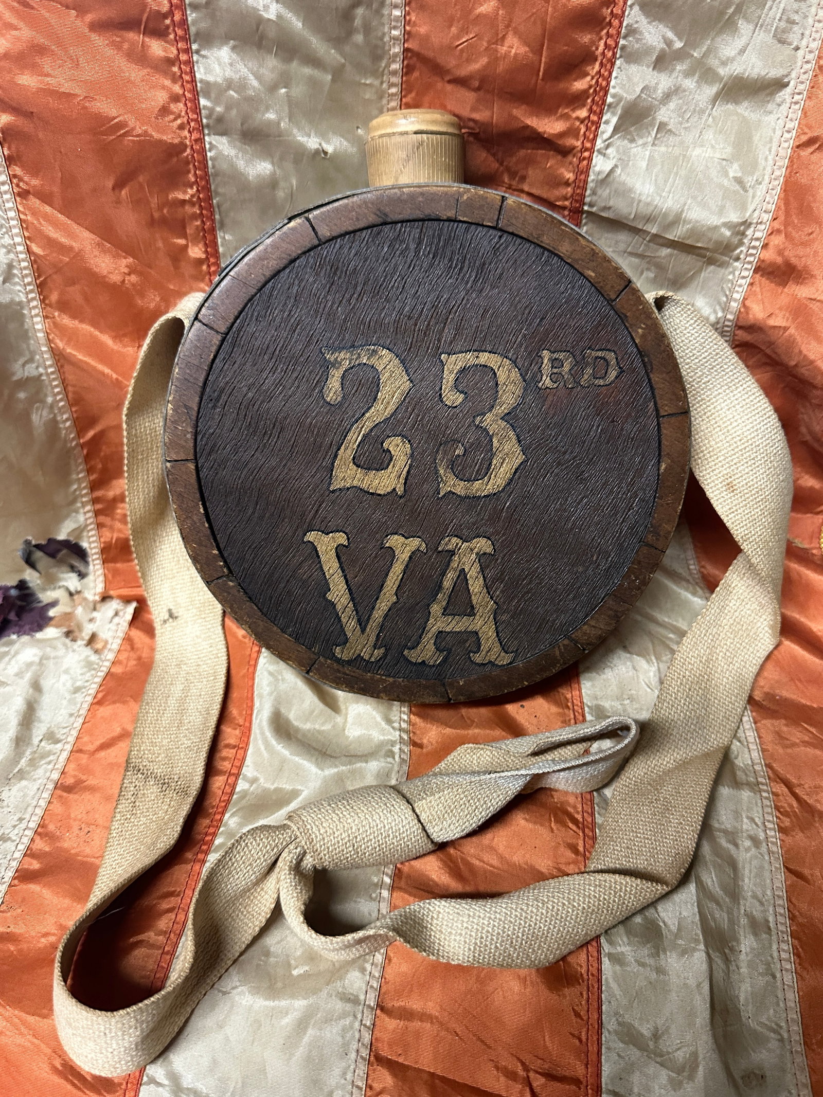 RARE CIVIL WAR 23RD CONFEDERATE VIRGINIA OFFICER CANTEEN WITH CANVAS SLING: RARE CIVIL WAR 23RD CONFEDERATE VIRGINIA OFFICER CANTEEN WITH CANVAS SLING. A RARE FIND. IT IS IN MINT OVERALL SHAPE AND CONDITION WITH A BEAUTIFUL OVERALL PATINA. SHOWS GOOD WEAR AND USE. PLEASE VIEW