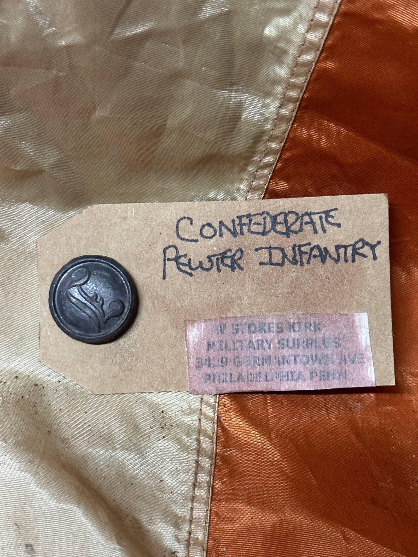 CIVIL WAR CONFEDERATE PEWTER INFANTRY BUTTON BY W. STOKES KIRK: CIVIL WAR CONFEDERATE PEWTER INFANTRY BUTTON BY W. STOKES KIRK. STILL HAS THE ORIGINAL MAKER MARK TAG ON IT. SHOWS GOOD WEAR AND USE. A GREAT FIND AND AN EXCELLENT ADDITION TO YOUR COLLECTION. A RARE 