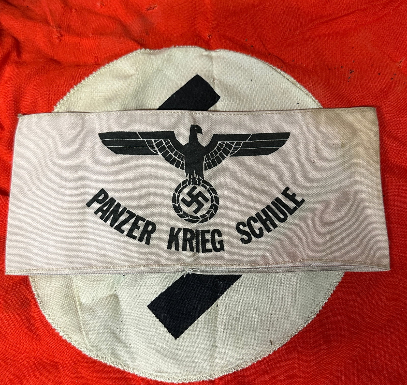 WW2 GERMAN PANZER KRIEG SCHULE ARMBAND: WW2 GERMAN PANZER KRIEG SCHULE ARMBAND. A RARE FIND. RETAINS MOST OF ITS ORIGINAL SHAPE AND CONDITION. SHOWS GOOD WEAR AND USE WITH A BEAUTIFUL PATINA THROUGHOUT. PLEASE VIEW ALL DETAILED PICTURES. A 