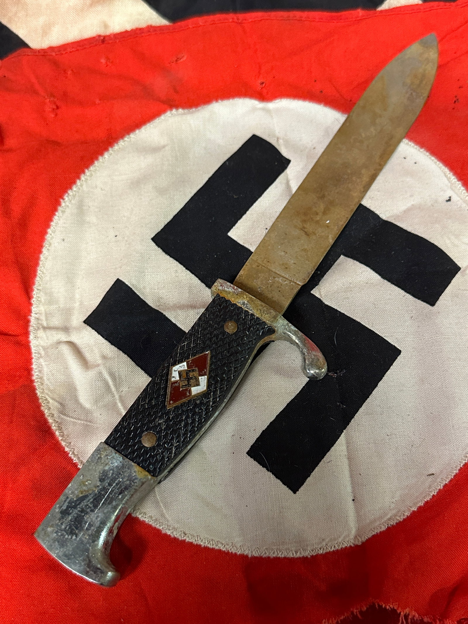 WW2 GERMAN HITLER YOUTH DAGGER WITH ENGRAVED BLADE: WW2 GERMAN HITLER YOUTH DAGGER WITH ENGRAVED BLADE "BLUT UND EHRE!" A RARE FIND. RETAINS MOST OF ITS ORIGINAL SHAPE AND CONDITION. SHOWS GOOD WEAR AND USE WITH A BEAUTIFUL PATINA THROUGHOUT. PLEASE VI