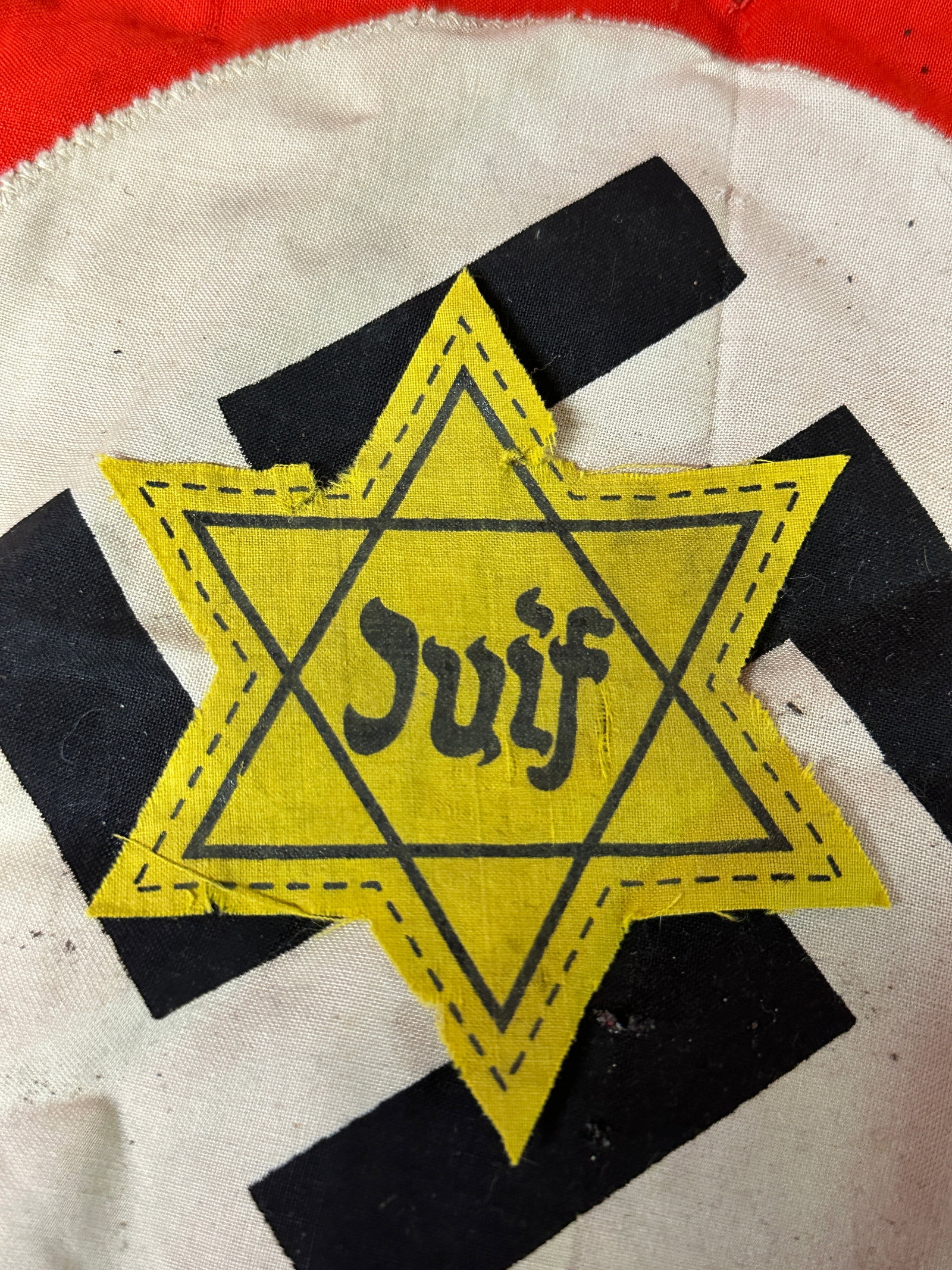 WW2 GERMAN JUIF STAR OF DAVID CLOTH PATCH: WW2 GERMAN JUIF STAR OF DAVID CLOTH PATCH. A RARE FIND. RETAINS MOST OF ITS ORIGINAL SHAPE AND CONDITION. SHOWS GOOD WEAR AND USE WITH A BEAUTIFUL PATINA THROUGHOUT. PLEASE VIEW ALL DETAILED PICTURES.