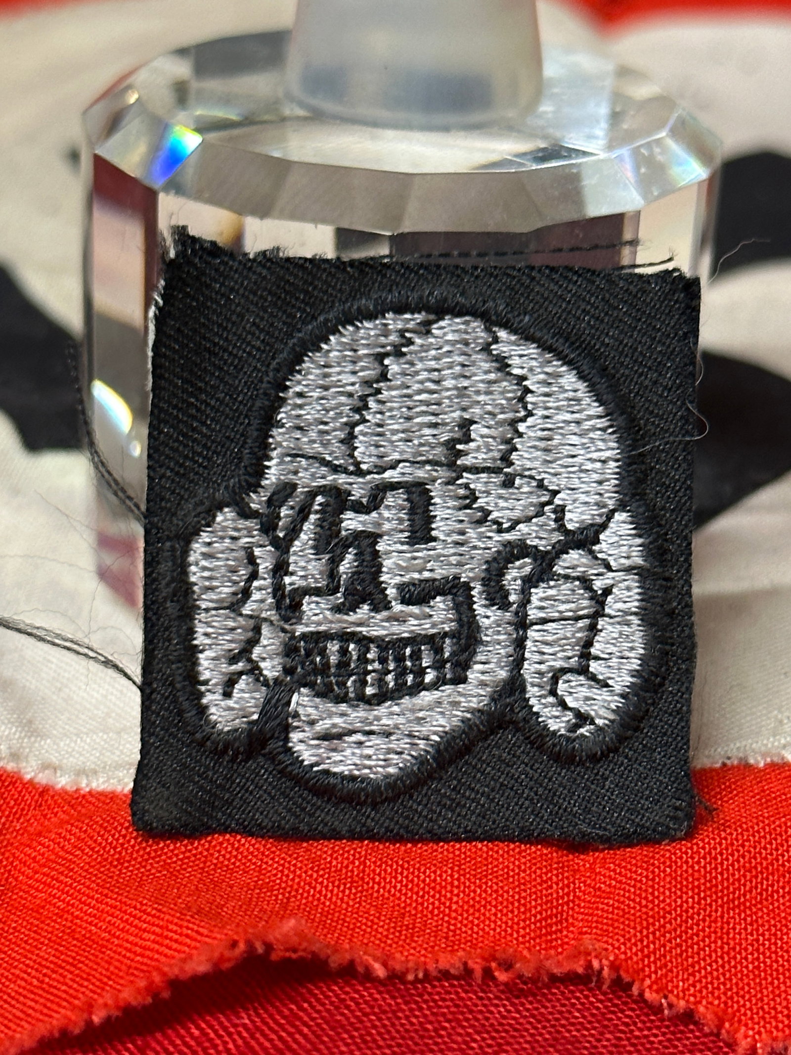 WW2 GERMAN TOTENKOPF SS SKULL CLOTH BADGE PATCH: WW2 GERMAN TOTENKOPF SS SKULL CLOTH BADGE PATCH. A RARE FIND. RETAINS MOST OF ITS ORIGINAL SHAPE AND CONDITION. SHOWS GOOD WEAR AND USE WITH A BEAUTIFUL PATINA THROUGHOUT. PLEASE VIEW ALL DETAILED PIC