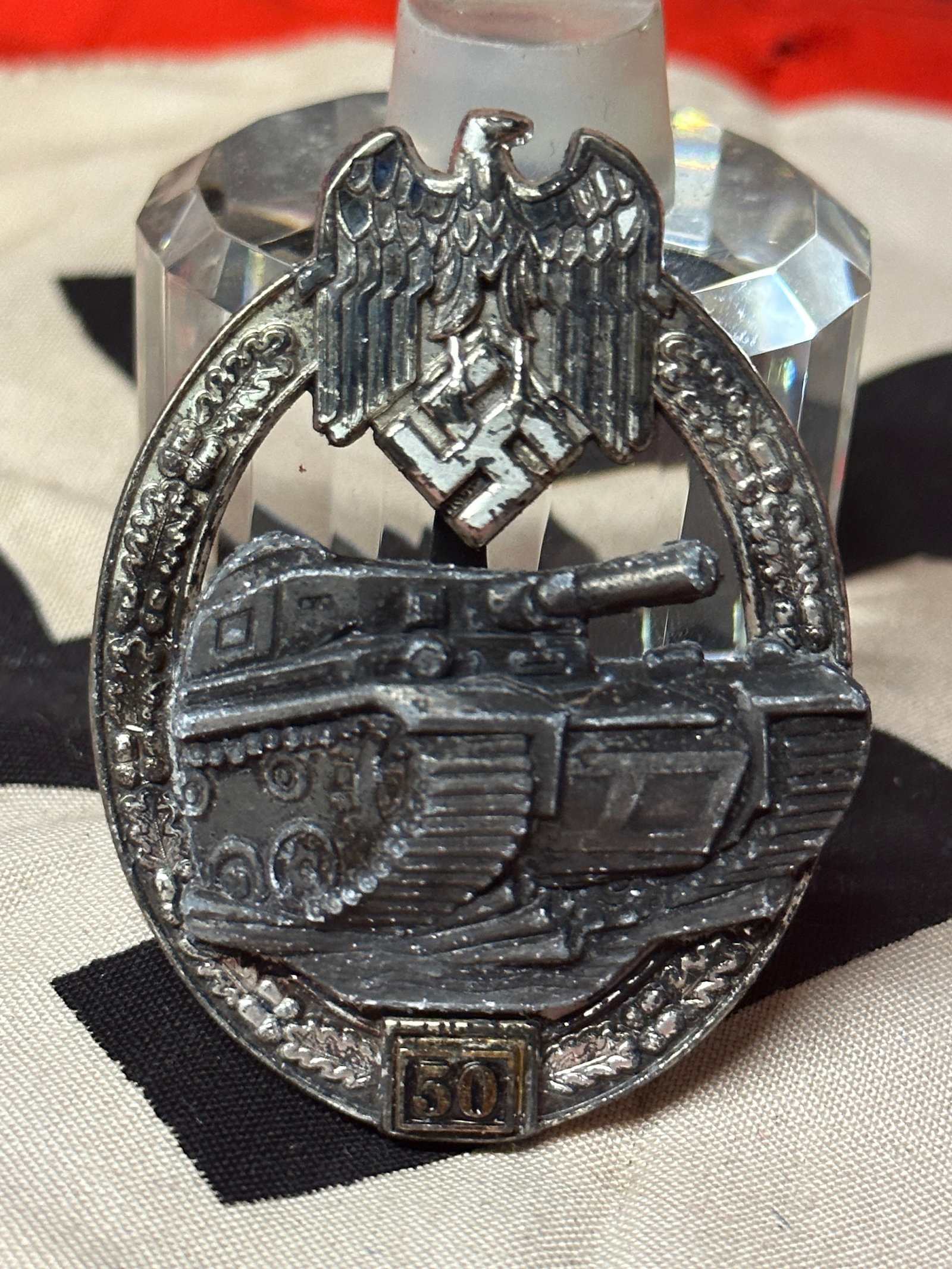 WW2 GERMAN PANZER TANK ASSAULT BADGE - 50 ENGAGEMENTS BY JFS: WW2 GERMAN PANZER TANK ASSAULT BADGE - 50 ENGAGEMENTS BY JFS. A RARE FIND. RETAINS MOST OF ITS ORIGINAL SHAPE AND CONDITION. SHOWS GOOD WEAR AND USE WITH A BEAUTIFUL PATINA THROUGHOUT. PLEASE VIEW ALL