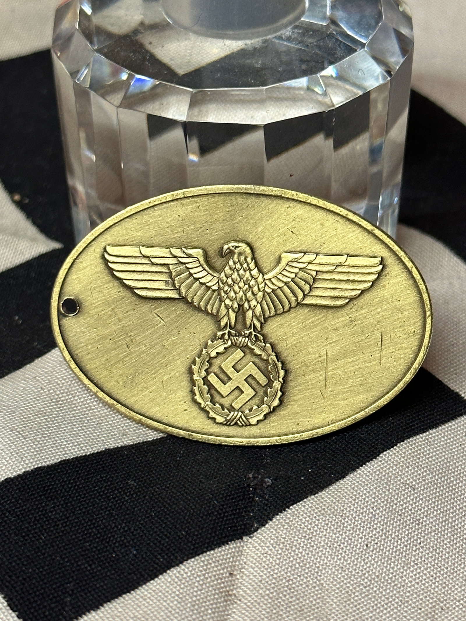 WW2 GERMAN STAATLICHE KRIMINAL POLICE ID DISK TAG: WW2 GERMAN STAATLICHE KRIMINAL POLICE ID DISK TAG. RETAINS MOST OF ITS ORIGINAL SHAPE AND CONDITION. SHOWS GOOD WEAR AND USE WITH A BEAUTIFUL PATINA THROUGHOUT. PLEASE VIEW ALL DETAILED PICTURES. A WE