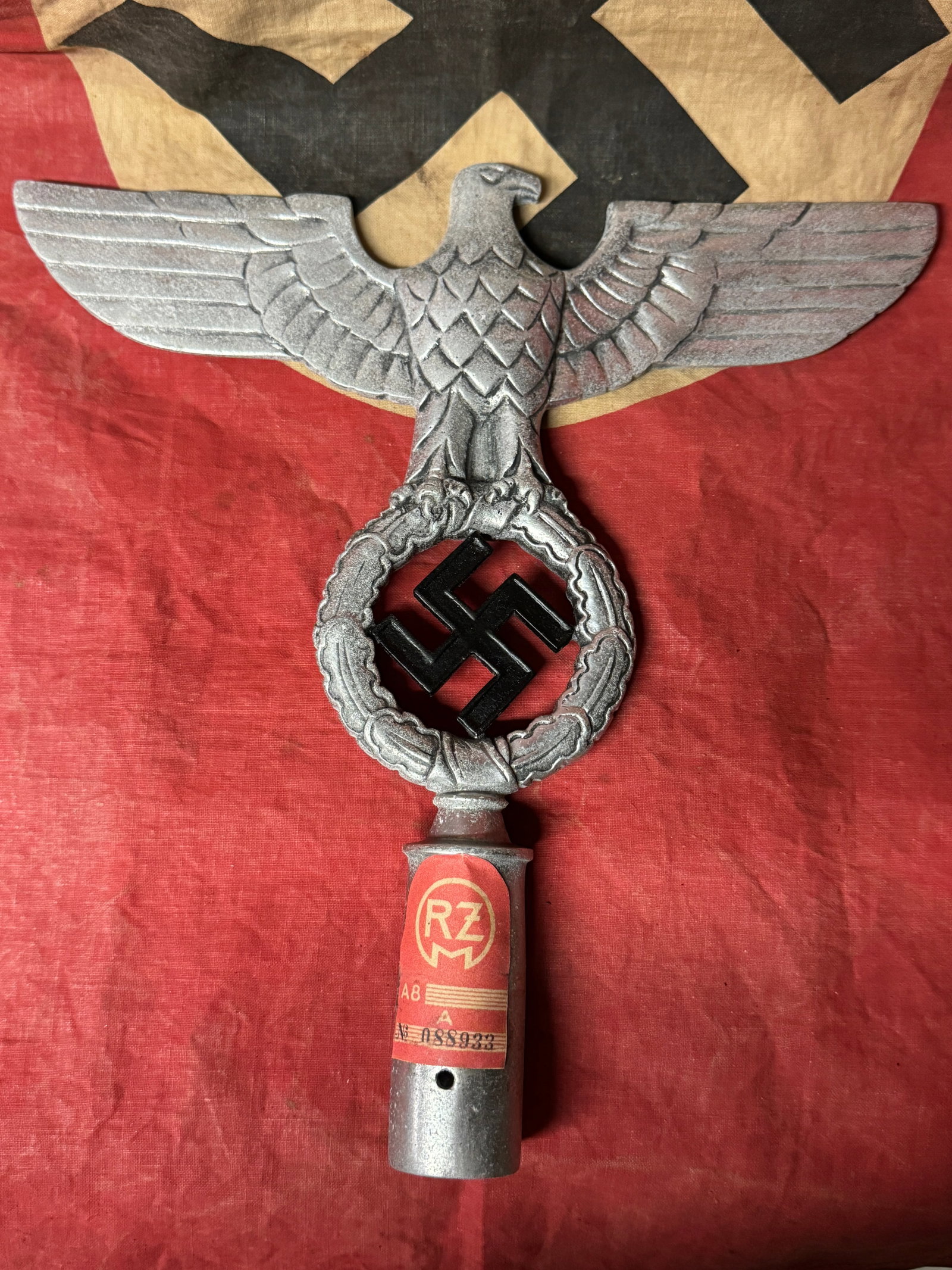 WWII NSDAP National Socialist Party Second Pattern Flag Pole Finial "Topper" - Aluminum W/ RZM Tag: WWII NSDAP National Socialist Party Second Pattern Flag Pole Finial "Topper" - Aluminum W/ RZM Tag. Unissued example that is a very rare find. Shows good wear and use with striking details and excelle