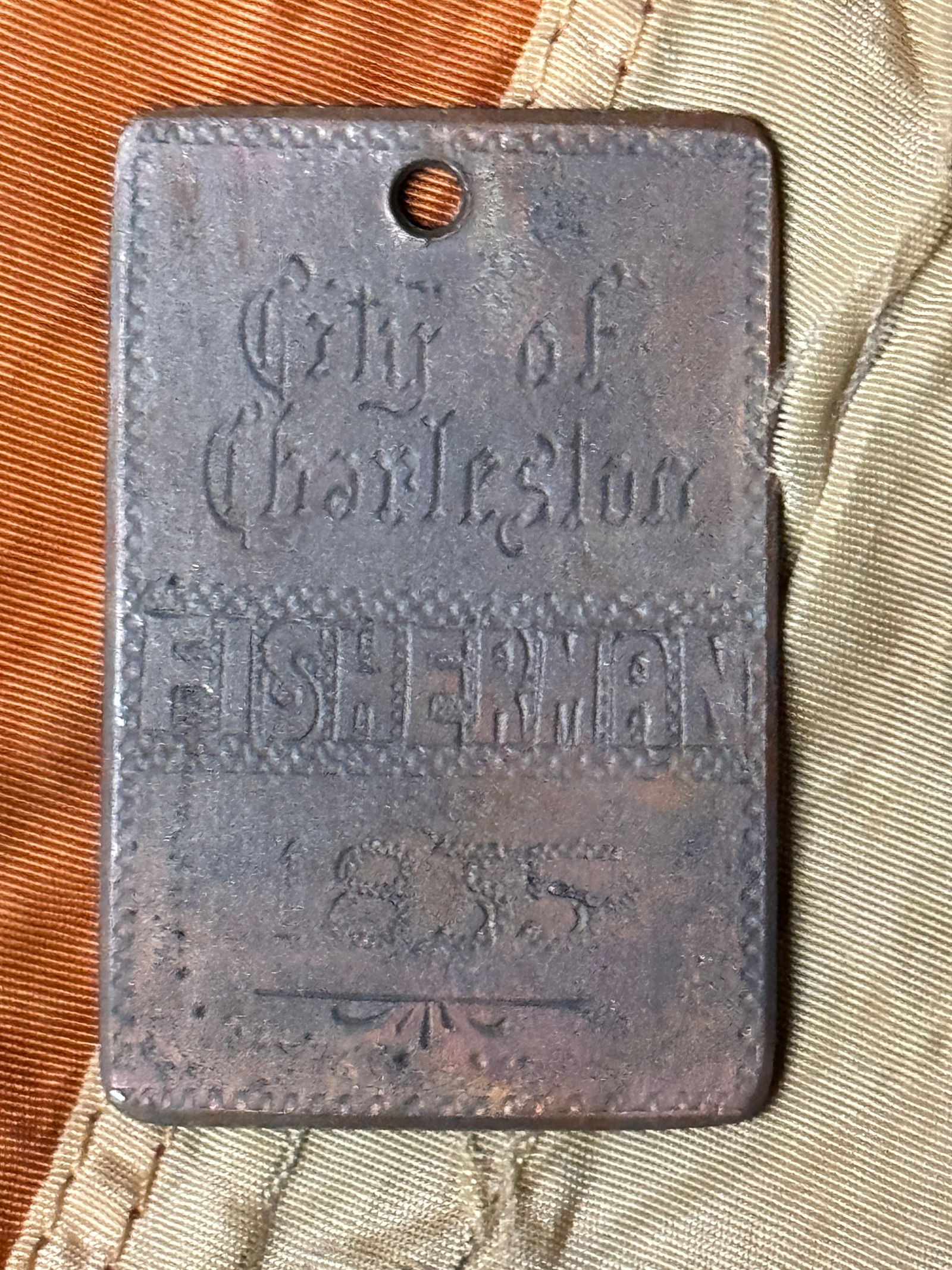 DATED 1835 CITY OF CHARLESTON FISHERMAN ID'D LAMAR SERVANT SLAVE TAG: DATED 1835 CITY OF CHARLESTON FISHERMAN ID'D LAMAR SERVANT SLAVE TAG. A RARE FIND. IT IS IN MINT OVERALL SHAPE AND CONDITION WITH A BEAUTIFUL PATINA THROUGHOUT. HAS A DUG LIKE PATINA THROUGHOUT. SHOWS