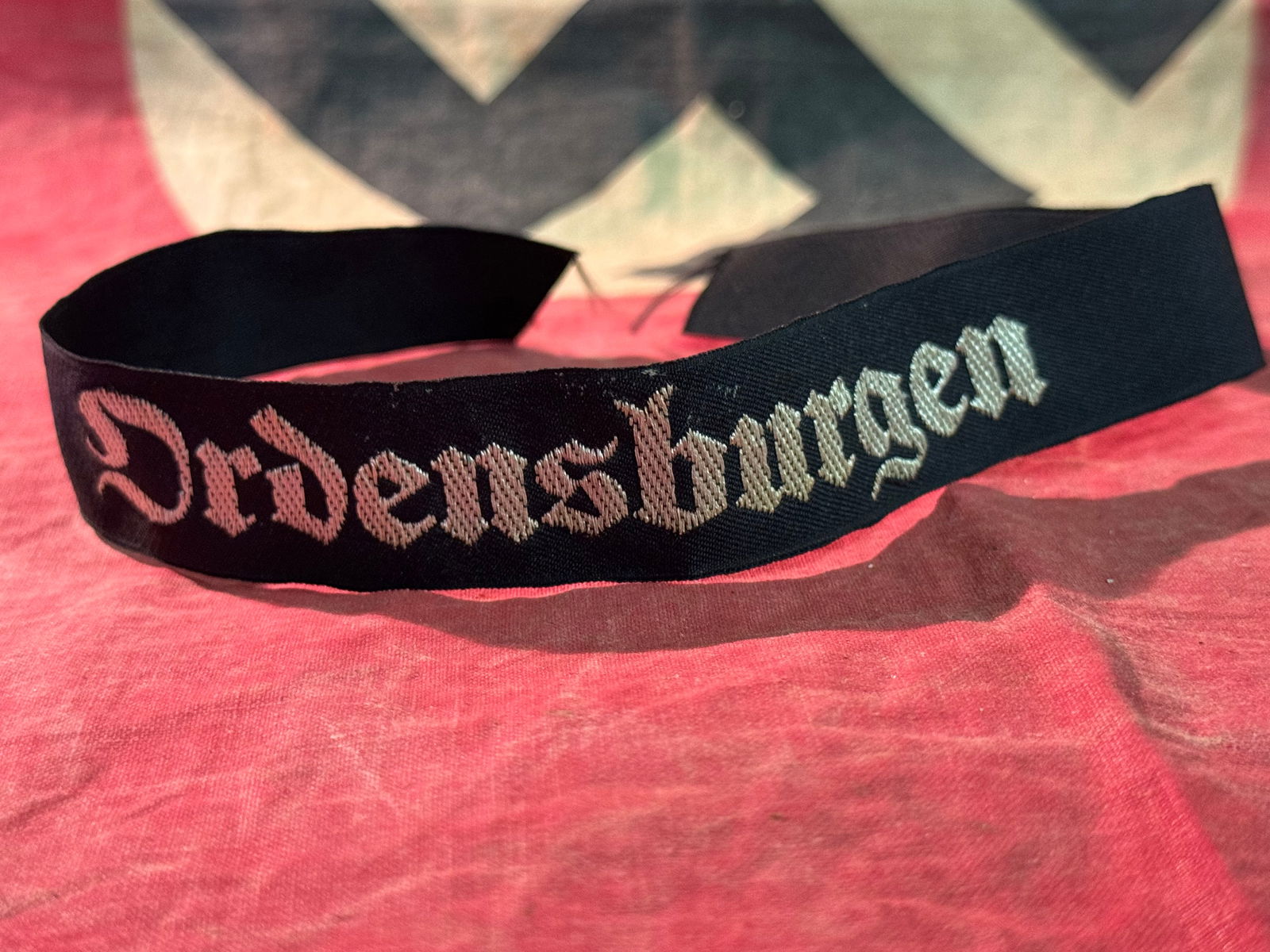 WW2 German Flat Wire ORDENSBURGEN Political Leader School Cuff Title Woven: WW2 German Flat Wire ORDENSBURGEN Political Leader School Cuff Title Woven. A RARE FIND. IT IS IN IN MINT OVERALL SHAPE AND CONDITION WITH A BEAUTIFUL OVERALL PATINA. A WELL MADE ANTIQUE GERMAN ARTIFA