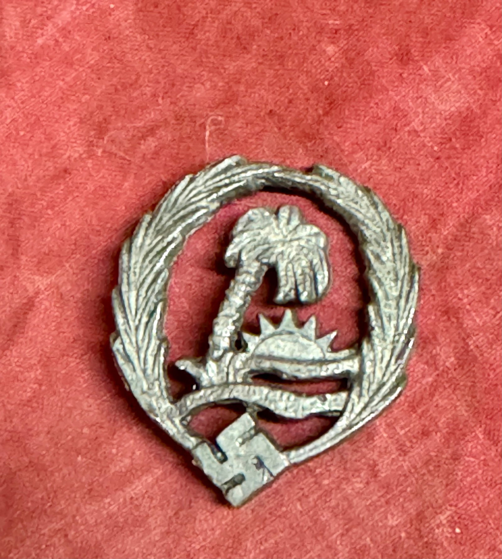 Afrika Korps Sonderverband 288 aged metal cap or tunic insignia: Afrika Korps Sonderverband 288 aged metal cap or tunic insignia. This badge was originally produced in Tunisia during the war, these added to the famous insignia worn by the Kampfgruppe Menton was pro