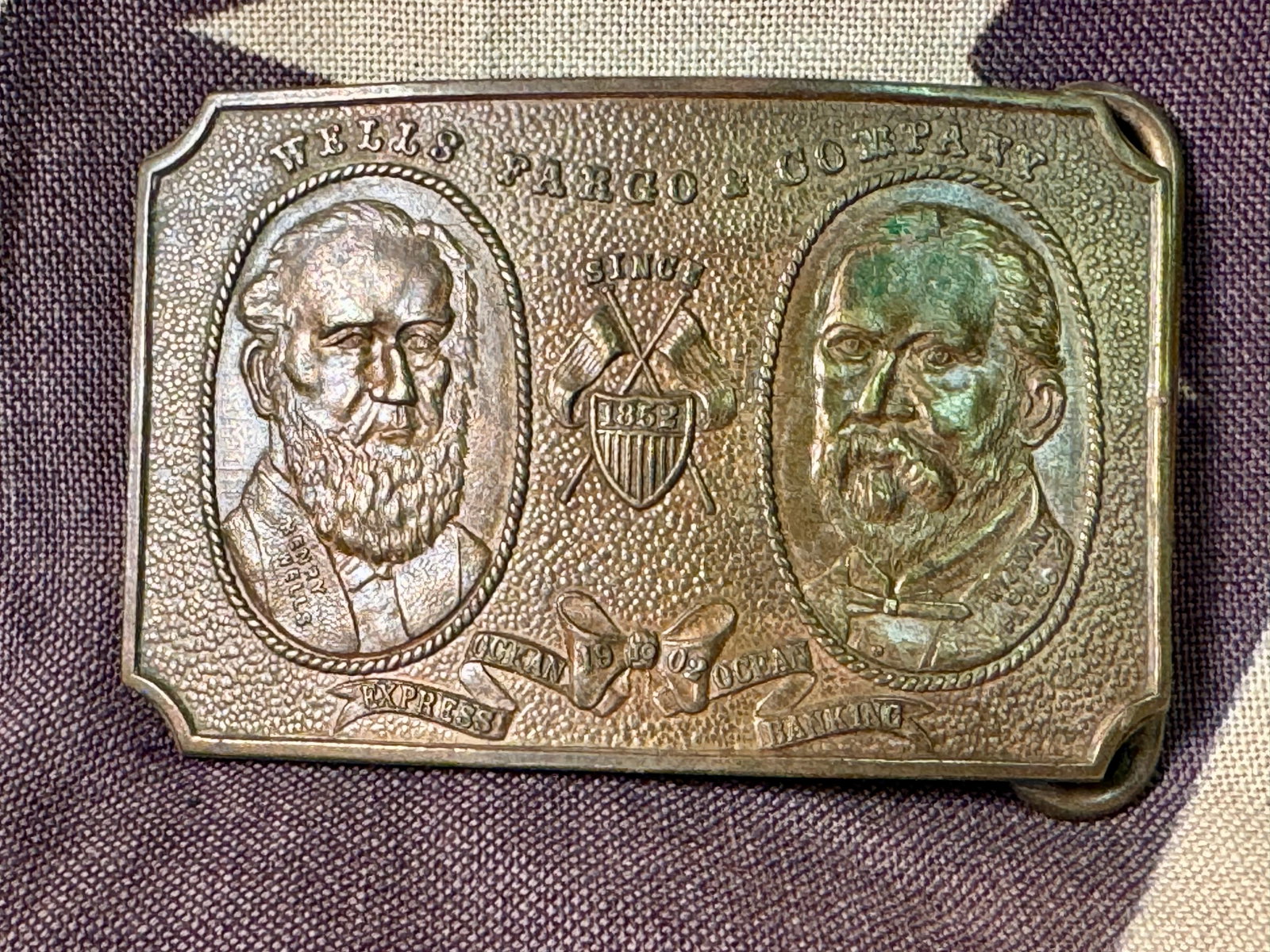 CIVIL WAR WELLS FARGO BELT BUCKLE BY TIFFANY AND CO. NY: CIVIL WAR WELLS FARGO BELT BUCKLE BY TIFFANY AND CO. NY. A RARE FIND. IT IS IN MINT OVERALL SHAPE AND CONDITION WITH A BEAUTIFUL OVERALL PATINA. A GREAT FIND AND AN EXCELLENT ADDITION TO YOUR COLLECTI