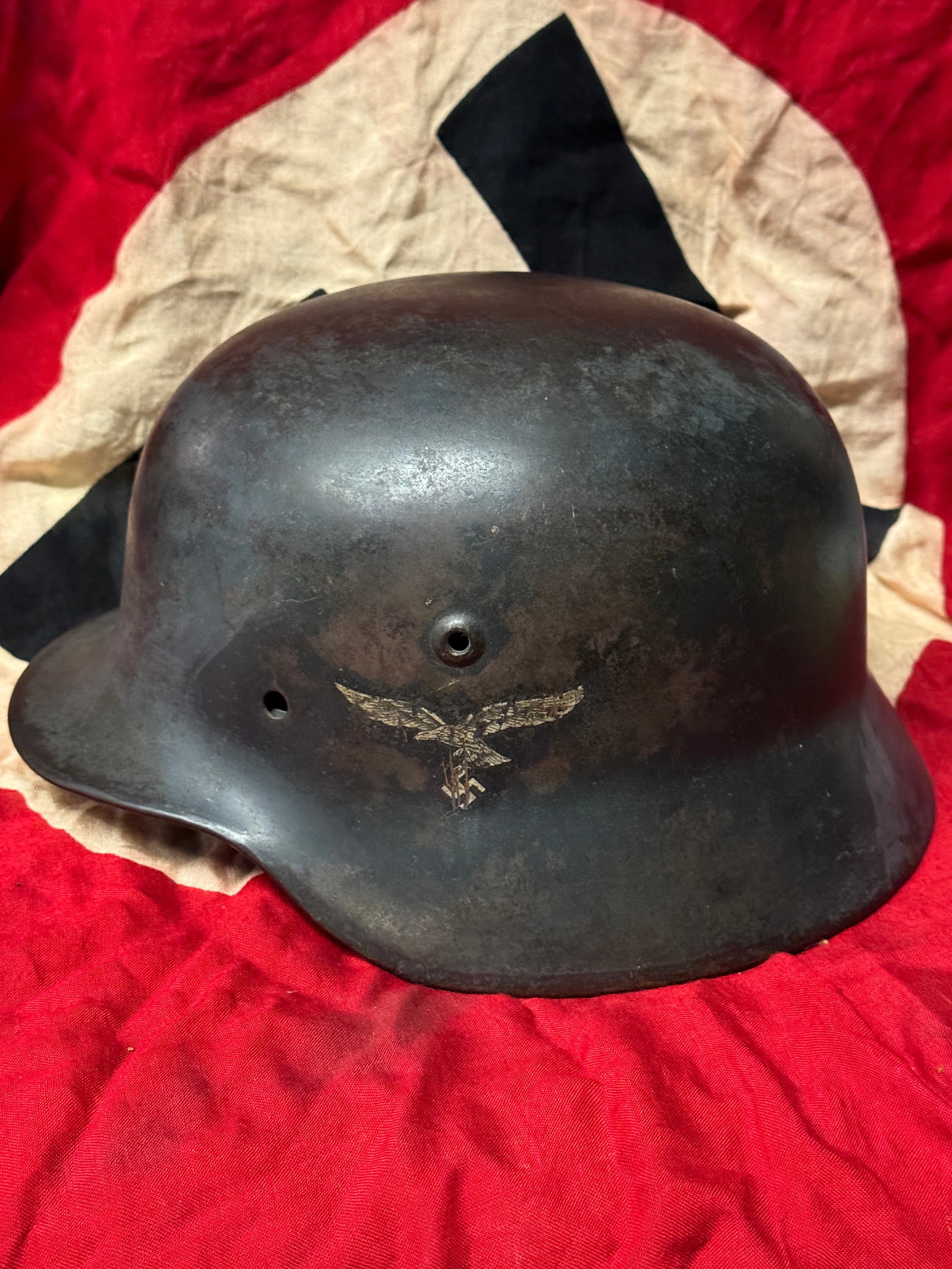 RARE WW2 GERMAN M40 FIELD USED LUFTWAFFE COMBAT HELMET WITH SINGLE DECAL: RARE WW2 GERMAN M40 FIELD USED LUFTWAFFE COMBAT HELMET WITH SINGLE DECAL. This one has the original Luftwaffe decal. Shows good wear and use with a beautiful patina throughout. This helmet is field us