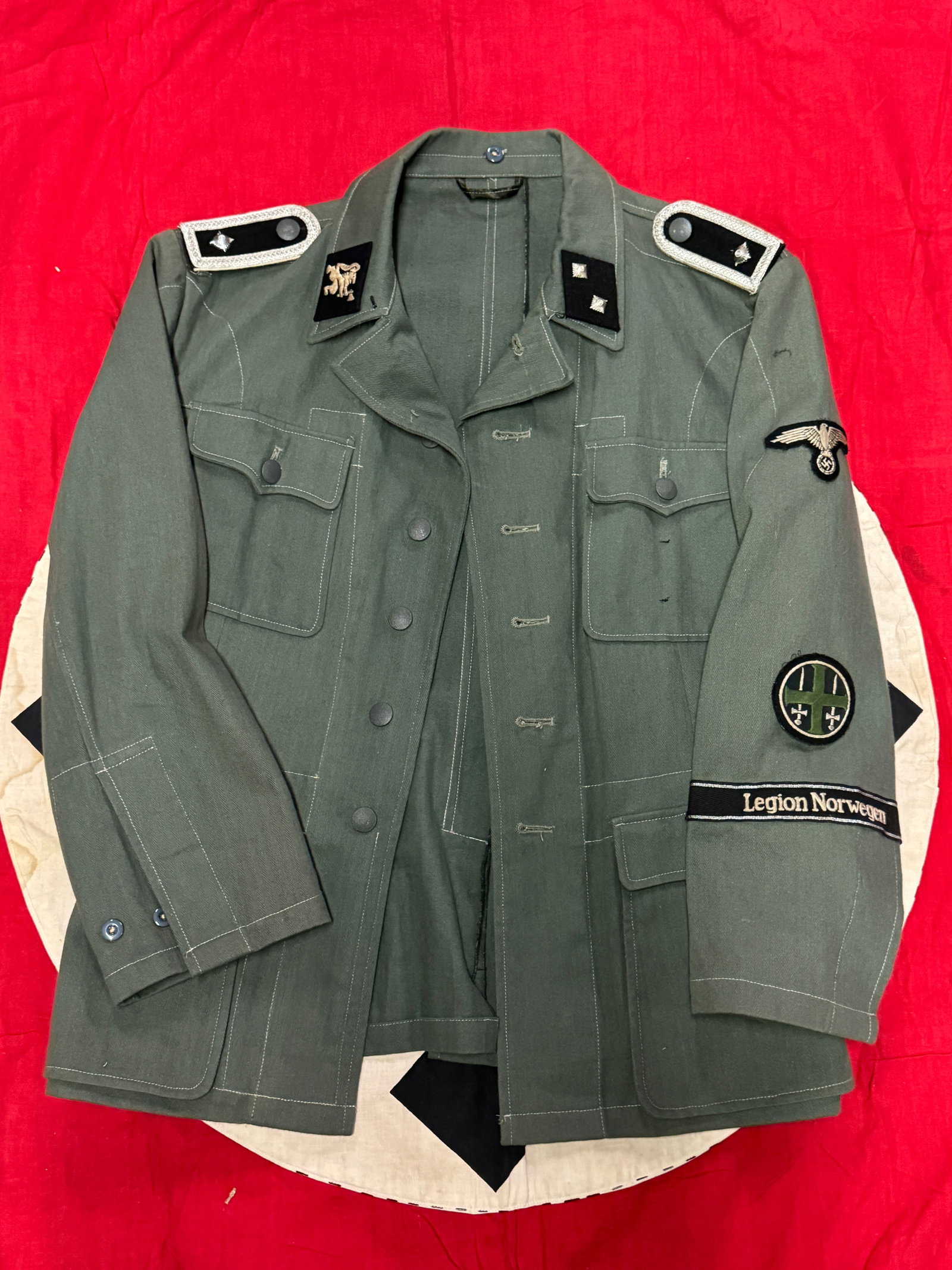 WW2 GERMAN WAFFEN SS LEGION NORWEGEN TUNIC JACKET: WW2 GERMAN WAFFEN SS LEGION NORWEGEN TUNIC JACKET. AN ULTRA RARE FIND THAT IS IN MINT OVERALL SHAPE AND CONDITION WITH A BEAUTIFUL OVERALL PATINA. SHOWS GOOD WEAR AND USE. PLEASE VIEW ALL DETAILED PIC