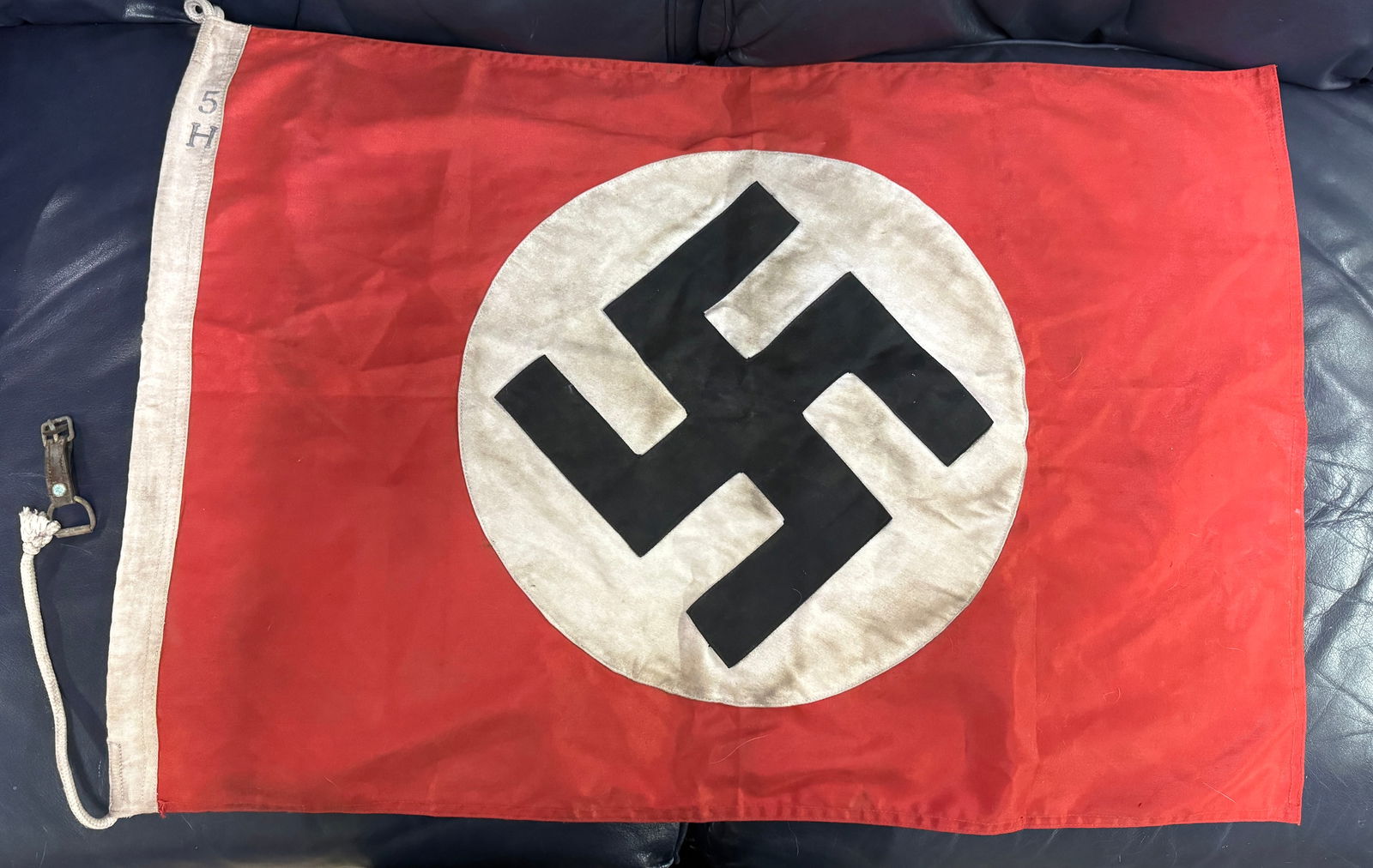 RARE WW2 GERMAN NSDAP POLITICAL FLAG MARKED H5: RARE WW2 GERMAN NSDAP POLITICAL FLAG MARKED H5. A RARE FIND. SHOWS GOOD WEAR AND USE WITH A BEAUTIFUL OVERALL PATINA. PLEASE VIEW ALL DETAILED PICTURES. A WELL MADE ANTIQUE GERMAN ARTIFACT.