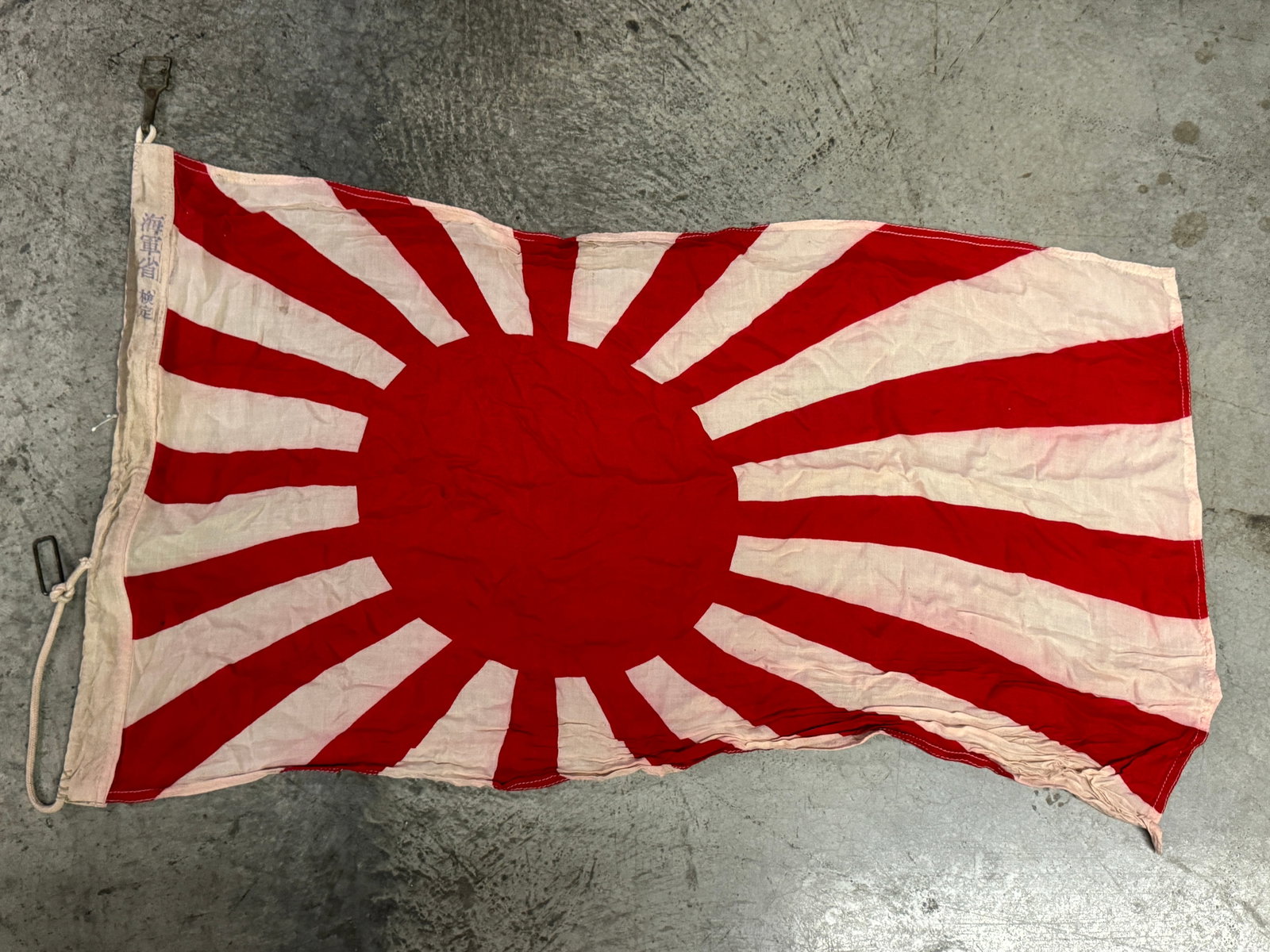 Japanese WWII Service Used Cotton Rising Sun Army War Flag: Japanese WWII Service Used Cotton Rising Sun Army War Flag. Shows good wear and use with a beautiful overall patina. Signed with maker marks - view pictures. Shows good battle wear and use. Please vie