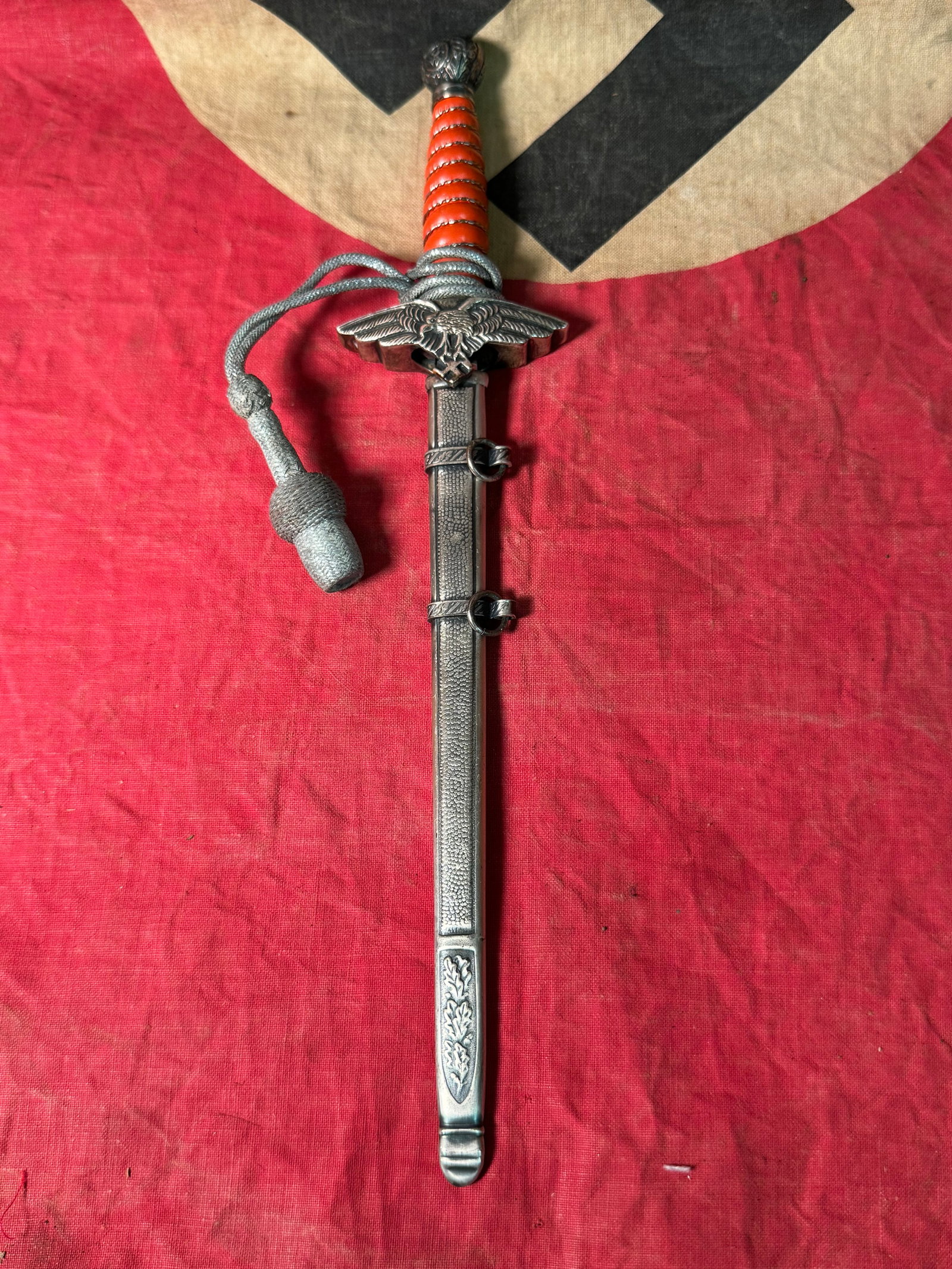 RARE WW2 GERMAN PRESENTATION LUFTWAFFE MINIATURE DAGGER WITH SHEATH: RARE WW2 GERMAN PRESENTATION LUFTWAFFE MINIATURE DAGGER WITH SHEATH. A VERY RARE FIND. BLADE IS MAKER MARKED FRIEDRICH PRFUSSE K.G. BRAUNSCHWEIG. 50 YEARS SERVICE. SHOWS GOOD WEAR AND USE WITH A BEAUT