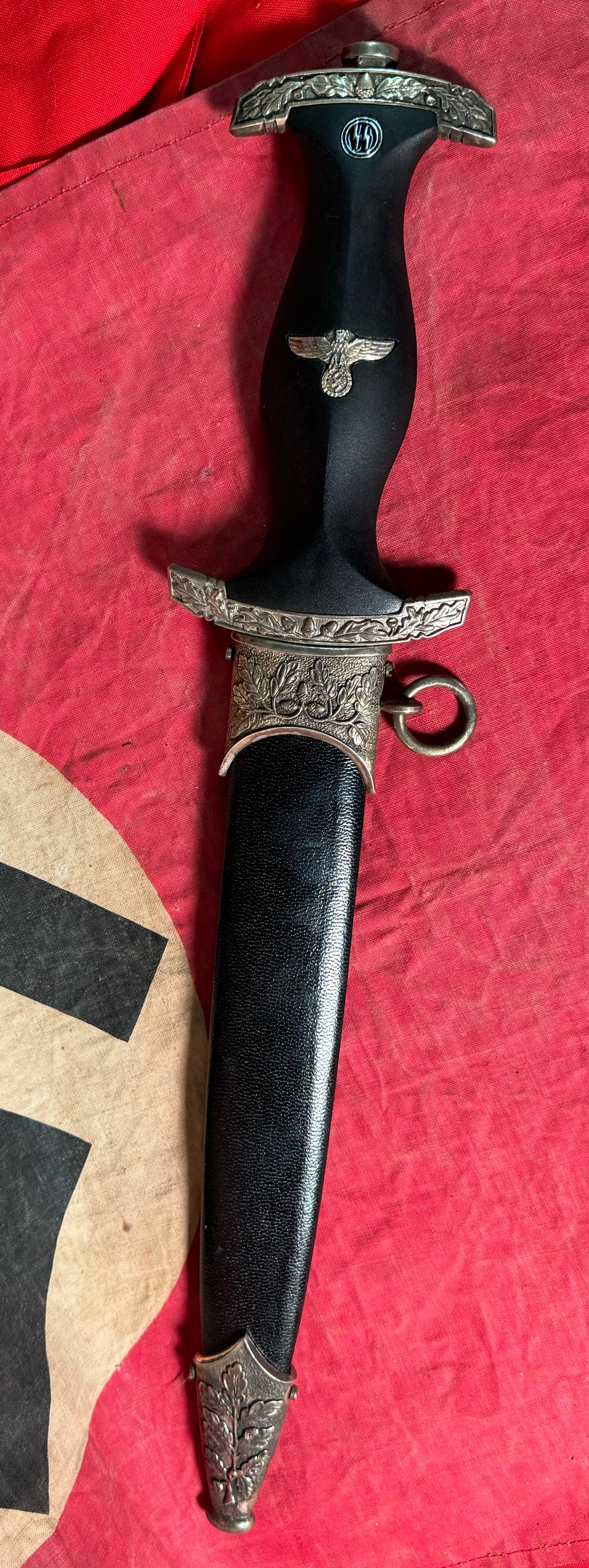 RARE WW2 GERMAN DECORATED WAFFEN SS OFFICER DAGGER WITH SHEATH: RARE WW2 GERMAN DECORATED WAFFEN SS OFFICER DAGGER WITH SHEATH - BLADE IS ETCHED "MEINE EHRE HEIBT TREUE" WITH MAKER MARKS CARL EICKHORN SOLINGEN. SHOWS GOOD WEAR AND USE WITH A BEAUTIFUL OVERALL PATI