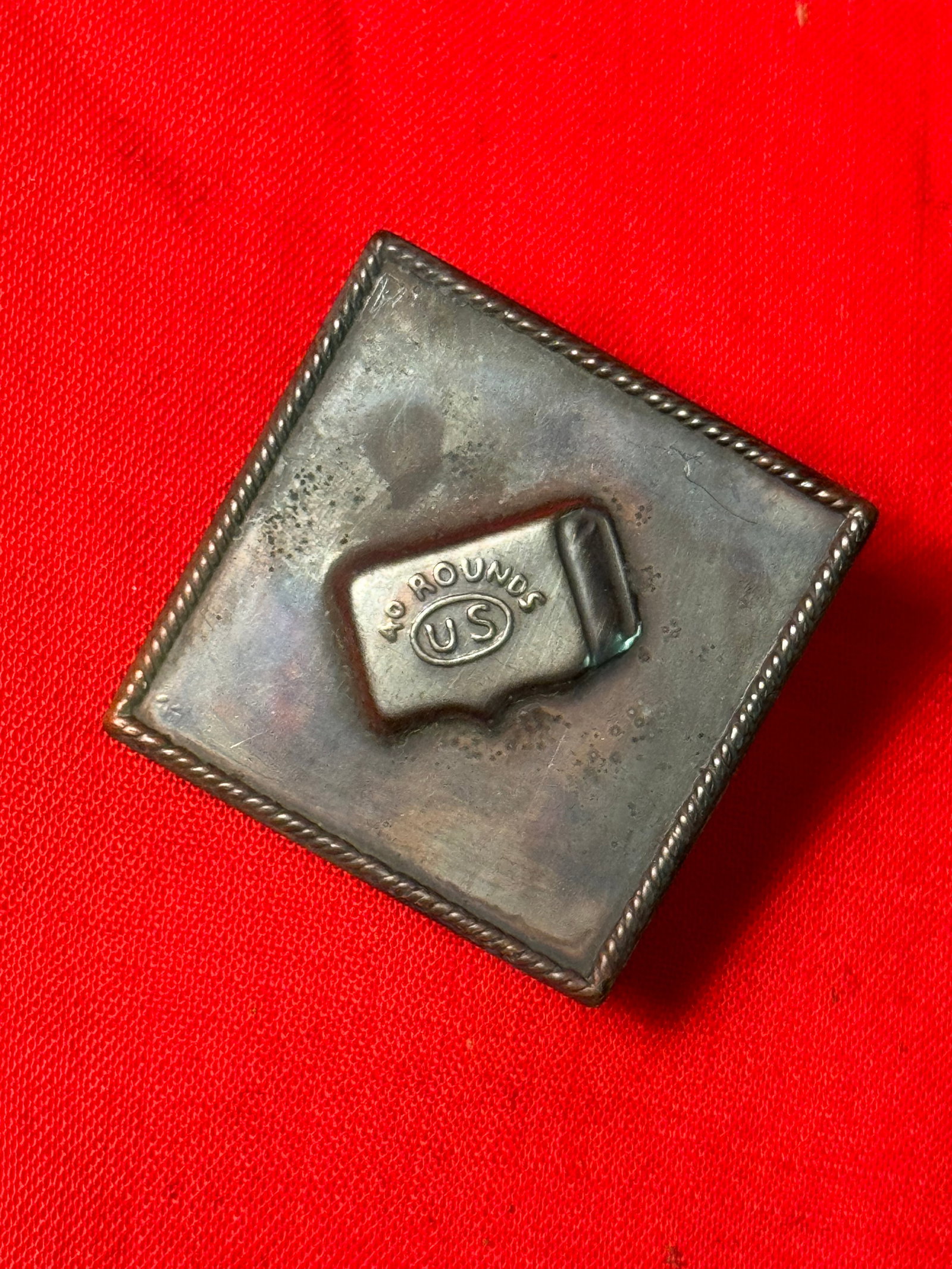 CIVIL WAR 15TH UNION CORPS - ARMY OF TENNESSEE BADGE INSIGNIA: CIVIL WAR 15TH UNION CORPS - ARMY OF TENNESSEE BADGE INSIGNIA. The design of the badge is a diamond shaped field with a raised cartridge box at center. The box is painted black with a plain brass oval