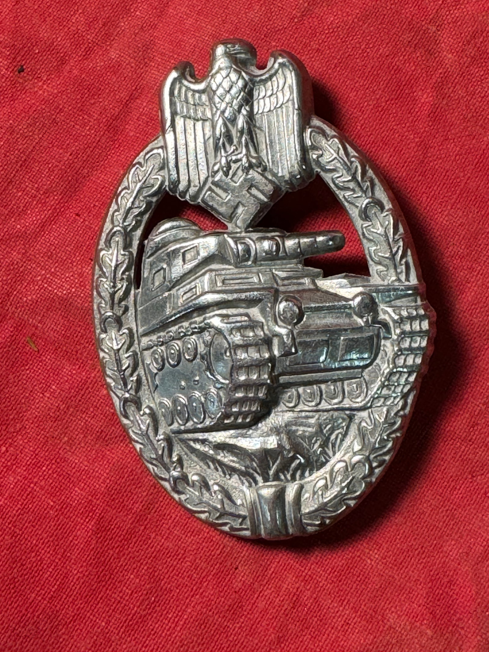 RARE WW2 GERMAN PANZER ASSAULT BADGE IN SILVER: RARE WW2 GERMAN PANZER ASSAULT BADGE IN SILVER. A RARE FIND. SHOWS GOOD WEAR AND USE WITH A BEAUTIFUL OVERALL PATINA. PLEASE VIEW ALL DETAILED PICTURES.