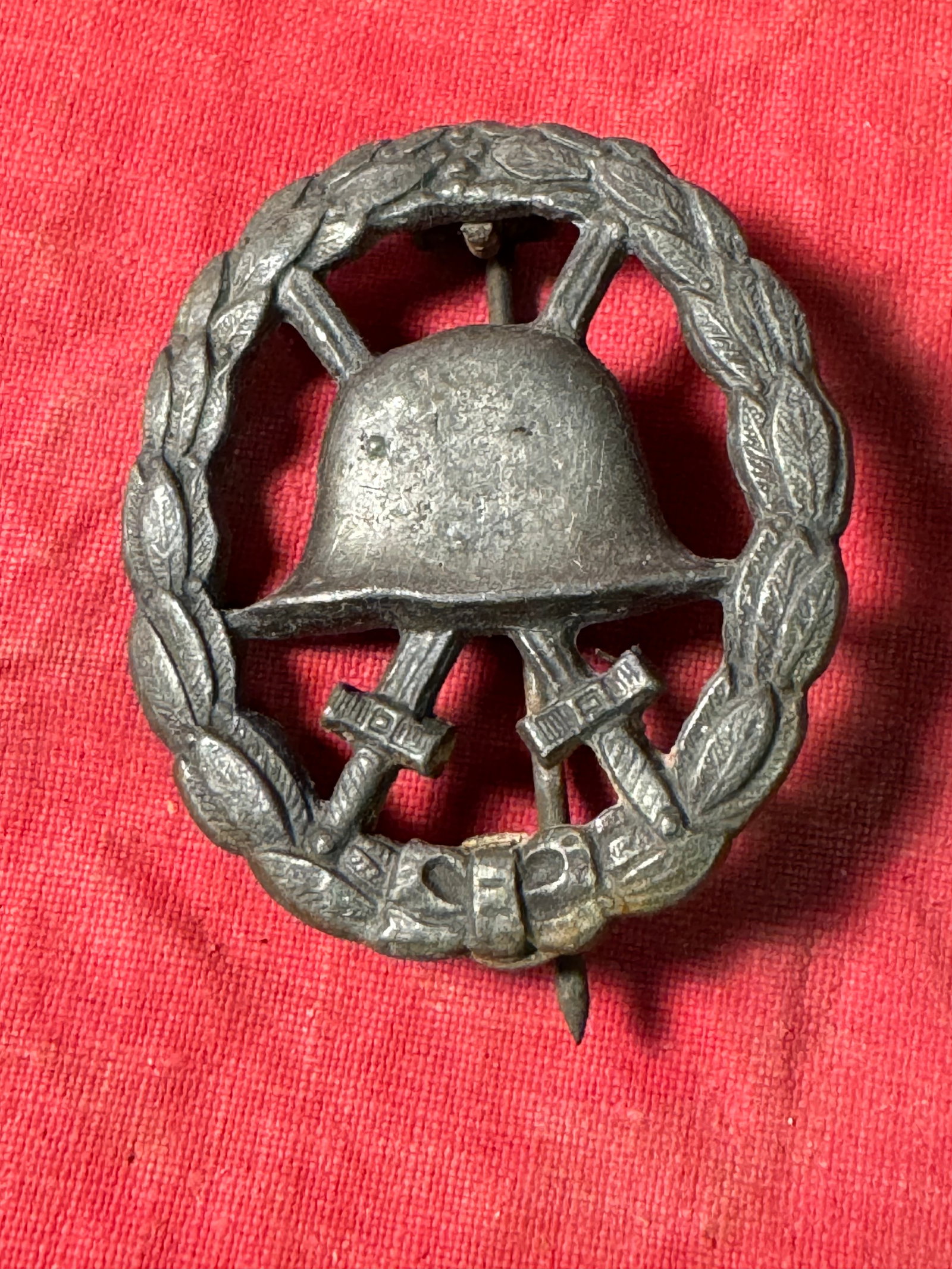 SCARCE WW1 GERMAN PRUSSIAN WOUND BADGE WITH SWORDS IN SILVER: SCARCE WW1 GERMAN PRUSSIAN WOUND BADGE WITH SWORDS IN SILVER. A RARE EXAMPLE. SHOWS GOOD WEAR AND USE WITH A BEAUTIFUL OVERALL PATINA. PLEASE VIEW ALL DETAILED PICTURES. A VERY RARE FIND.