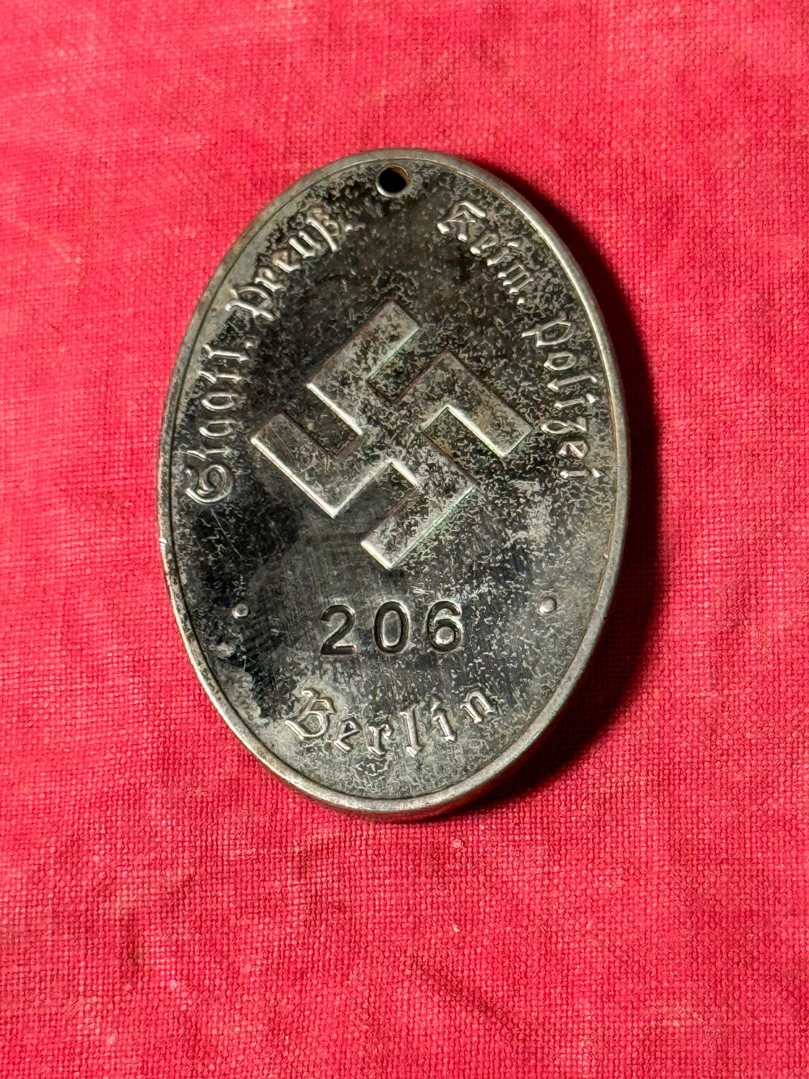 RARE WW2 GERMAN PRUSSIAN POLICE TAG WITH ID NUMBER: RARE WW2 GERMAN PRUSSIAN POLICE TAG WITH ID NUMBER. A SCARCE EXAMPLE. SHOWS GOOD WEAR AND USE WITH A BEAUTIFUL OVERALL PATINA. PLEASE VIEW ALL DETAILED PICTURES. A WELL MADE ANTIQUE GERMAN ARTIFACT.