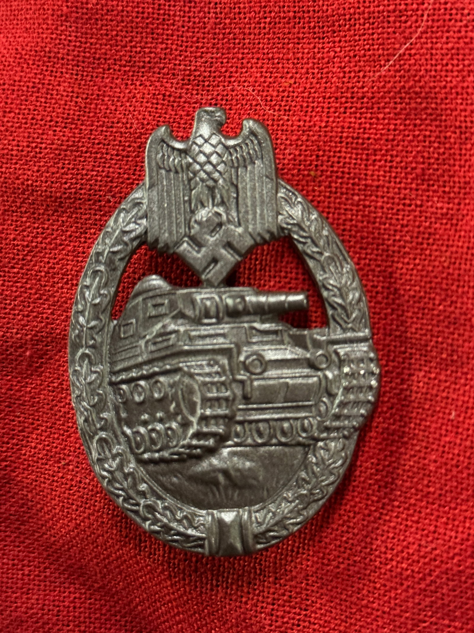 Rare WW2 German Army / Waffen SS Panzer Assault Badge in Silver: Rare WW2 German Army / Waffen SS Panzer Assault Badge in Silver. The heavy, solid badge shows wear and toning of the silver finish. The badge shows fine detail and it is in very good condition. A rare