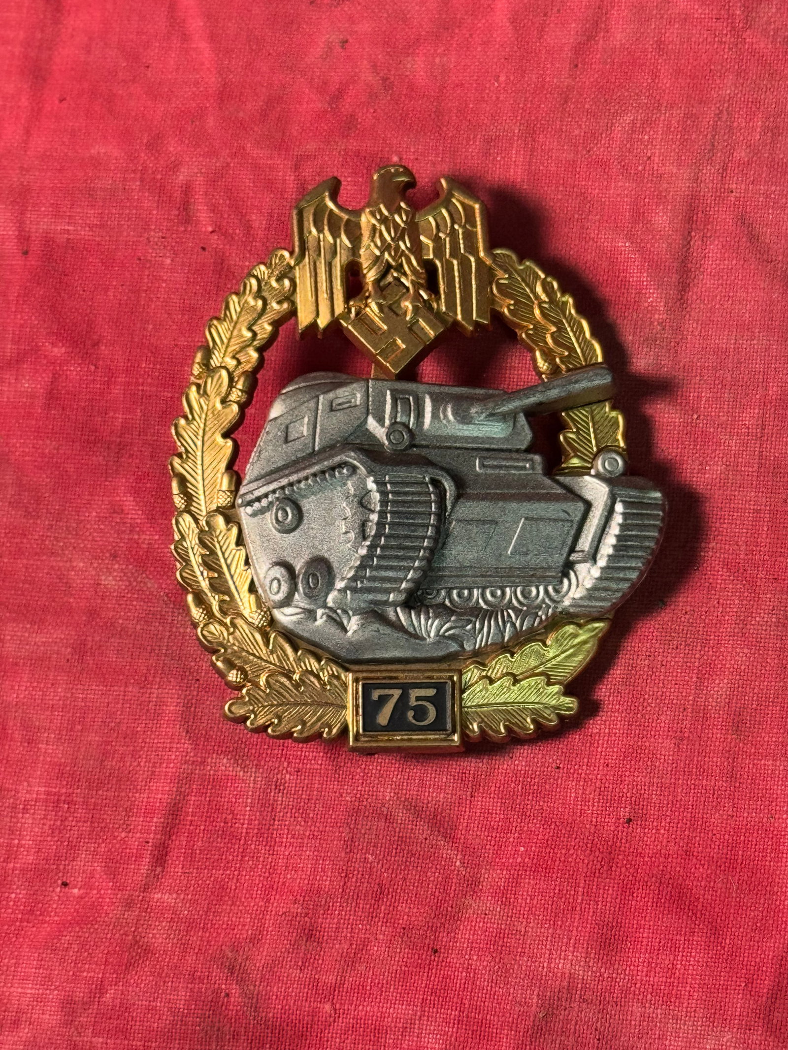 WW2 GERMAN PANZER BADGE FOR 75 ASSAULTS BY JFS: WW2 GERMAN PANZER BADGE FOR 75 ASSAULTS BY JFS. SHOWS GOOD WEAR AND USE WITH A BEAUTIFUL OVERALL PATINA. The Panzer Badge (German: Panzerkampfabzeichen) was a World War II German military decoration a