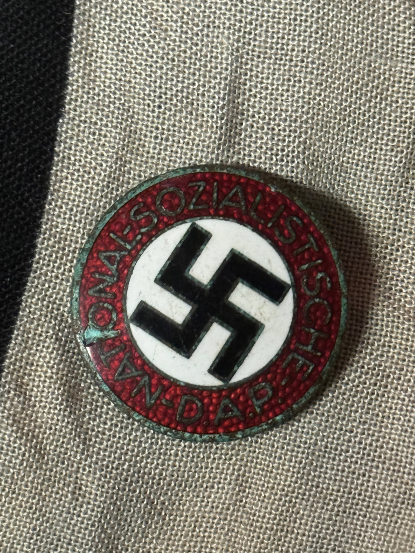 WW2 GERMAN NSDAP ENAMELED LAPEL PIN BY RZM M1/23: WW2 GERMAN NSDAP ENAMELED LAPEL PIN BY RZM M1/23. A VERY RARE FIND. SHOWS GOOD WEAR AND USE WITH A BEAUTIFUL OVERALL PATINA. IN BATTLE WORN AND USED SHAPE AND CONDITION. PLEASE VIEW ALL DETAILED PICTU