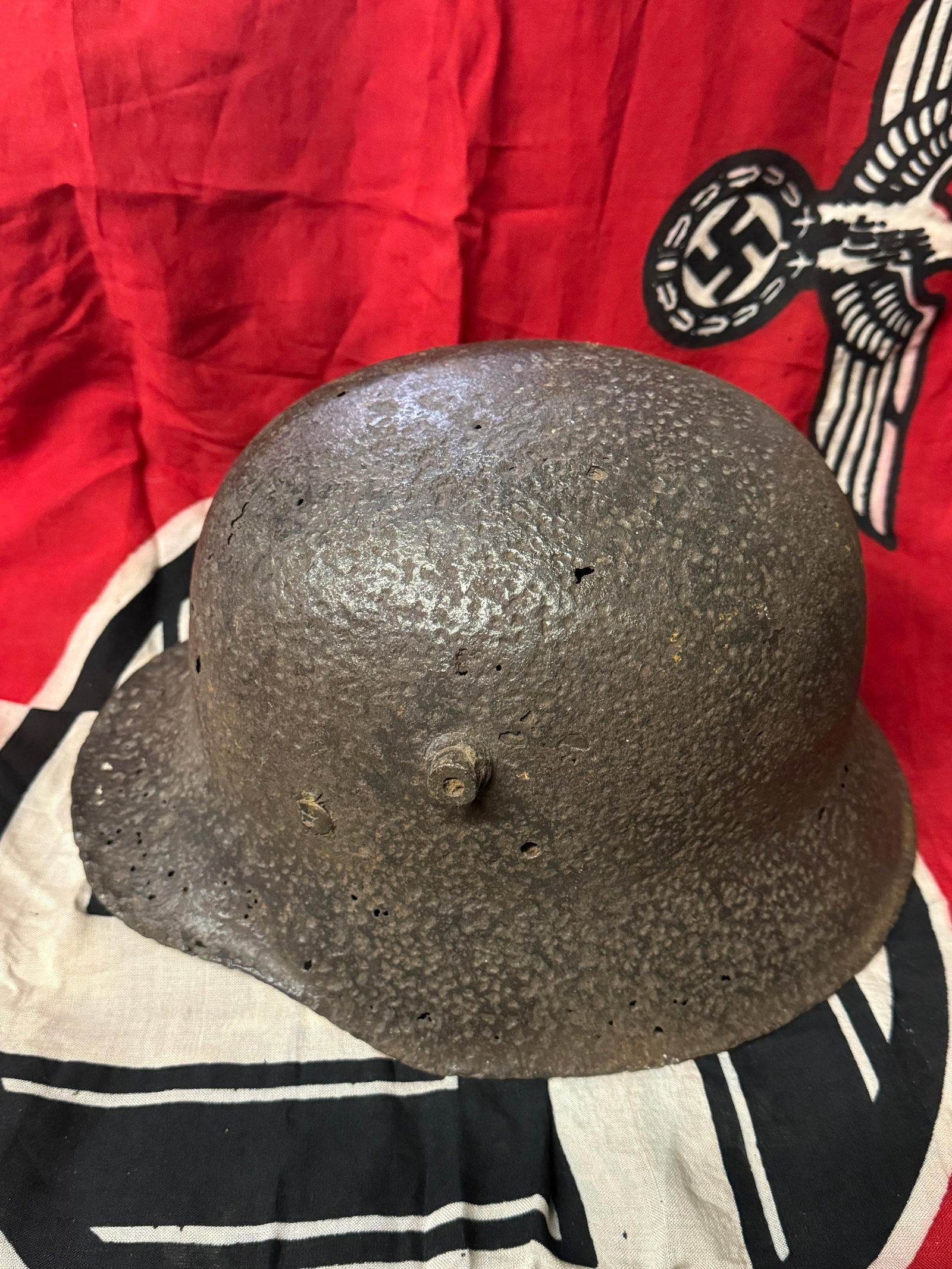 RARE WW2 GERMAN POLICE RECOVERED HELMET WITH FRAGMENT DAMAGE: RARE WW2GERMAN POLICE RECOVERED HELMET WITH FRAGMENT DAMAGE. A VERY RARE ITEM. HAS THE FRAGMENT DAMAGE THAT LOOKS LIKE SCATTERED HOLES THROUGHOUT. PLEASE VIEW ALL DETAILED PICTURES. A WELL MADE ANTIQU
