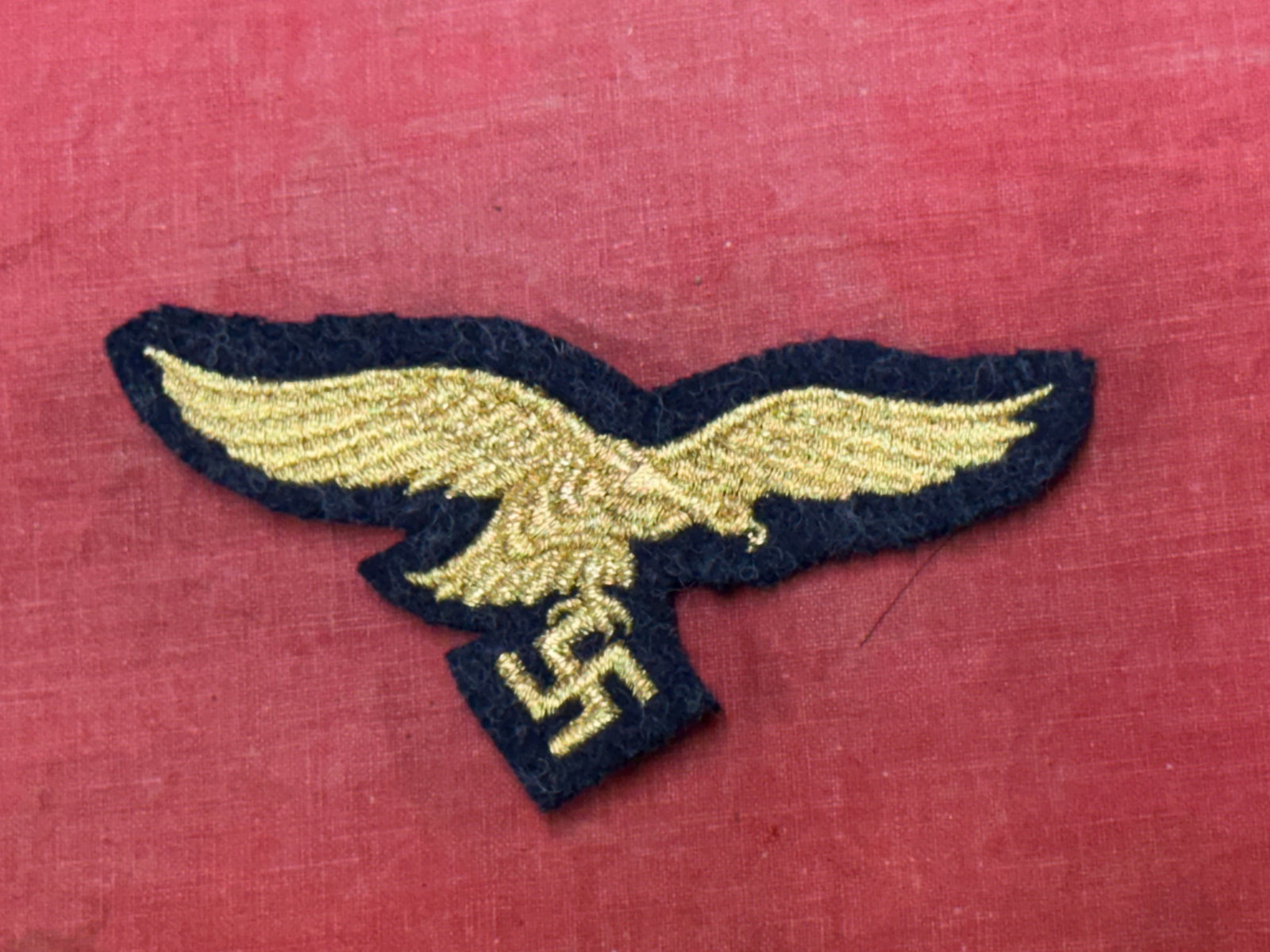 WW2 German LW General Officer Panzer Cap Eagle - Bullion: WW2 German LW General Officer Panzer Cap Eagle - Bullion. A rare example. Shows good wear and use with a beautiful overall patina. Please view all detailed pictures. A well made antique German artifac