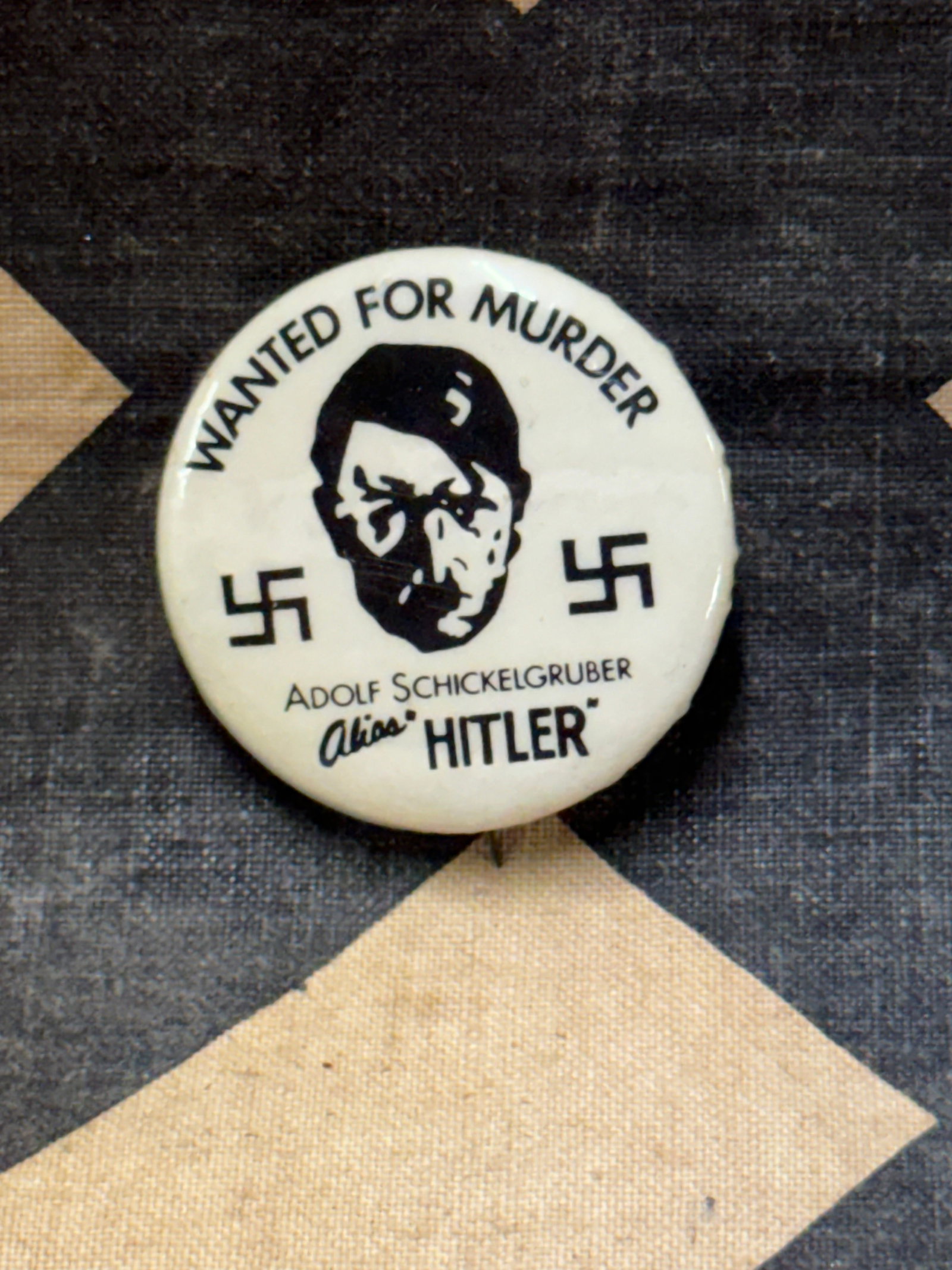 WW2 GERMAN 1940'S ANTI HITLER "HITLER WANTED" STICKPIN: WW2 GERMAN 1940'S ANTI HITLER "HITLER WANTED" STICKPIN. SHOWS GOOD WEAR AND USE WITH A BEAUTIFUL OVERALL PATINA. PLEASE VIEW ALL DETAILED PICTURES. A WELL MADE ANTIQUE GERMAN ARTIFACT.