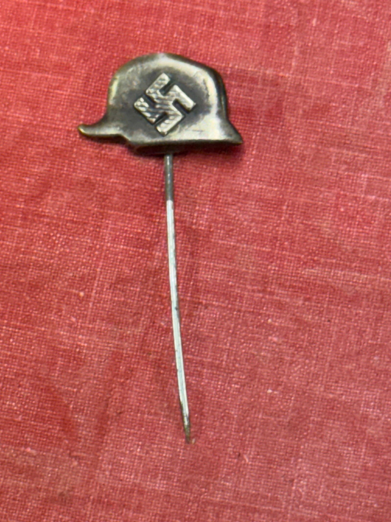 WW2 GERMAN OFFICER HELMET WITH SWASTIKA TUNIC STICKPIN: WW2 GERMAN OFFICER HELMET WITH SWASTIKA TUNIC STICKPIN