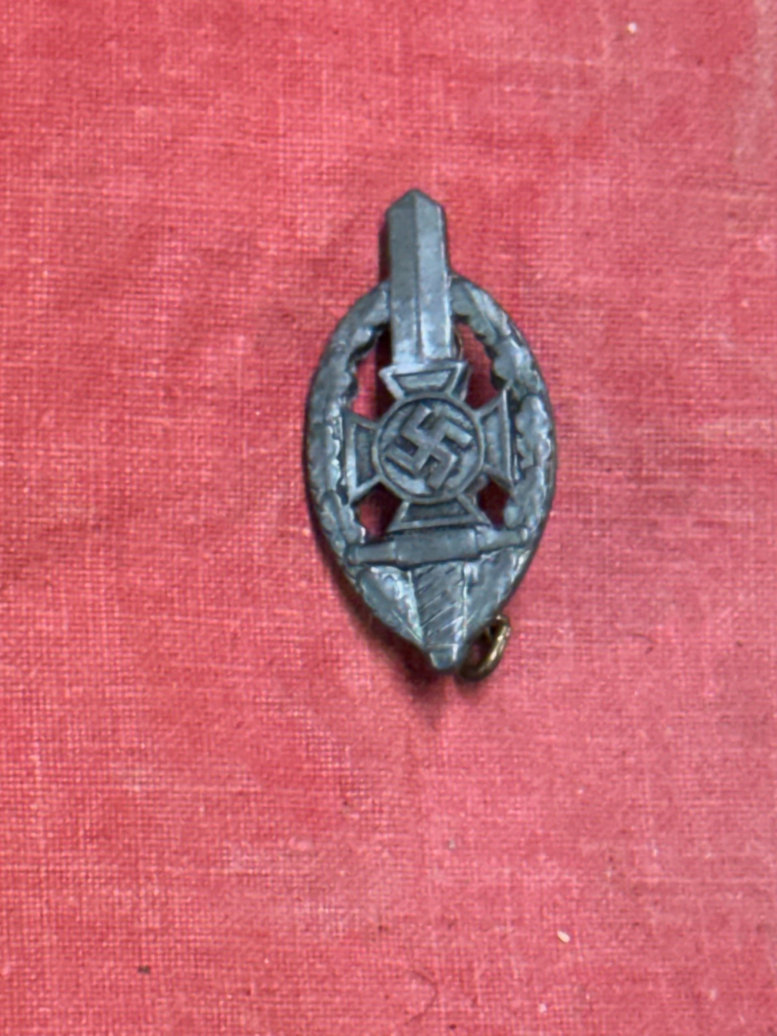 WW2 GERMAN NSKOV MEMBER BADGE BY RZM: WW2 GERMAN NSKOV MEMBER BADGE BY RZM. SHOWS GOOD WEAR AND USE WITH A BEAUTIFUL OVERALL PATINA. A RARE EXAMPLE.