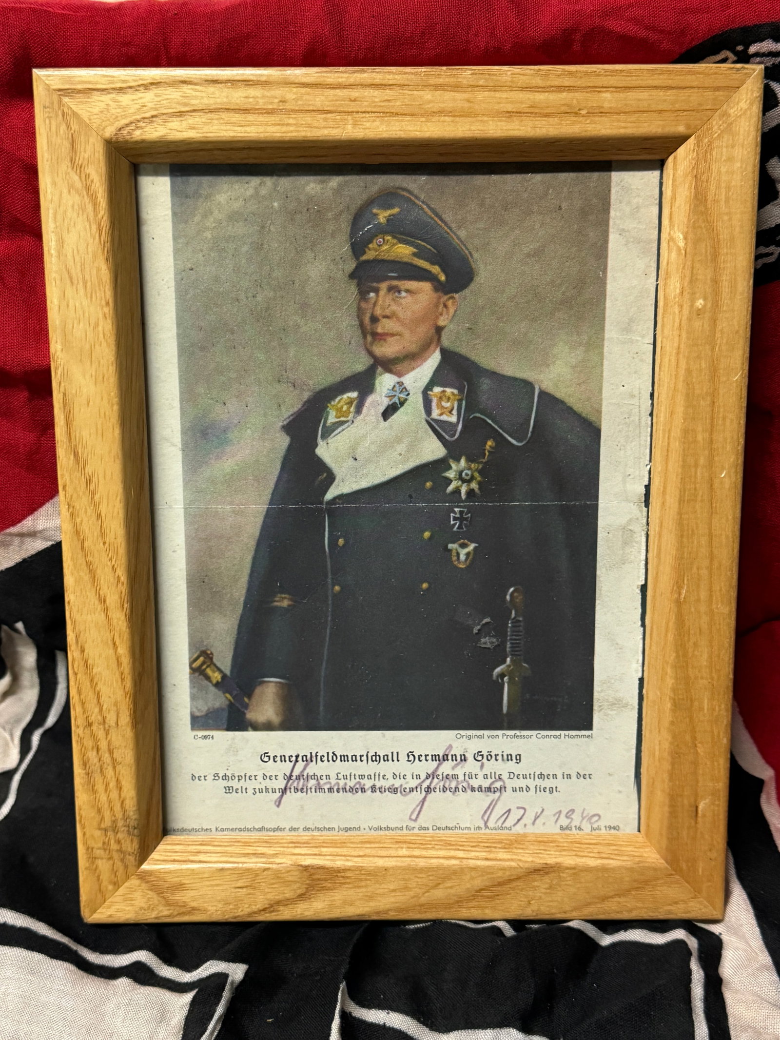 RARE WW2 GERMAN HERMANN GORING SIGNED COLORED PHOTOGRPAH IN FRAME: RARE WW2 GERMAN HERMANN GORING SIGNED COLORED PHOTOGRPAH IN FRAME. A VERY RARE FIND. 100% AUTHENTIC SIGNATURE. SHOWS GOOD WEAR AND USE WITH A BEAUTIFUL OVERALL PATINA. COMES FROM A HIGH END COLLECTION