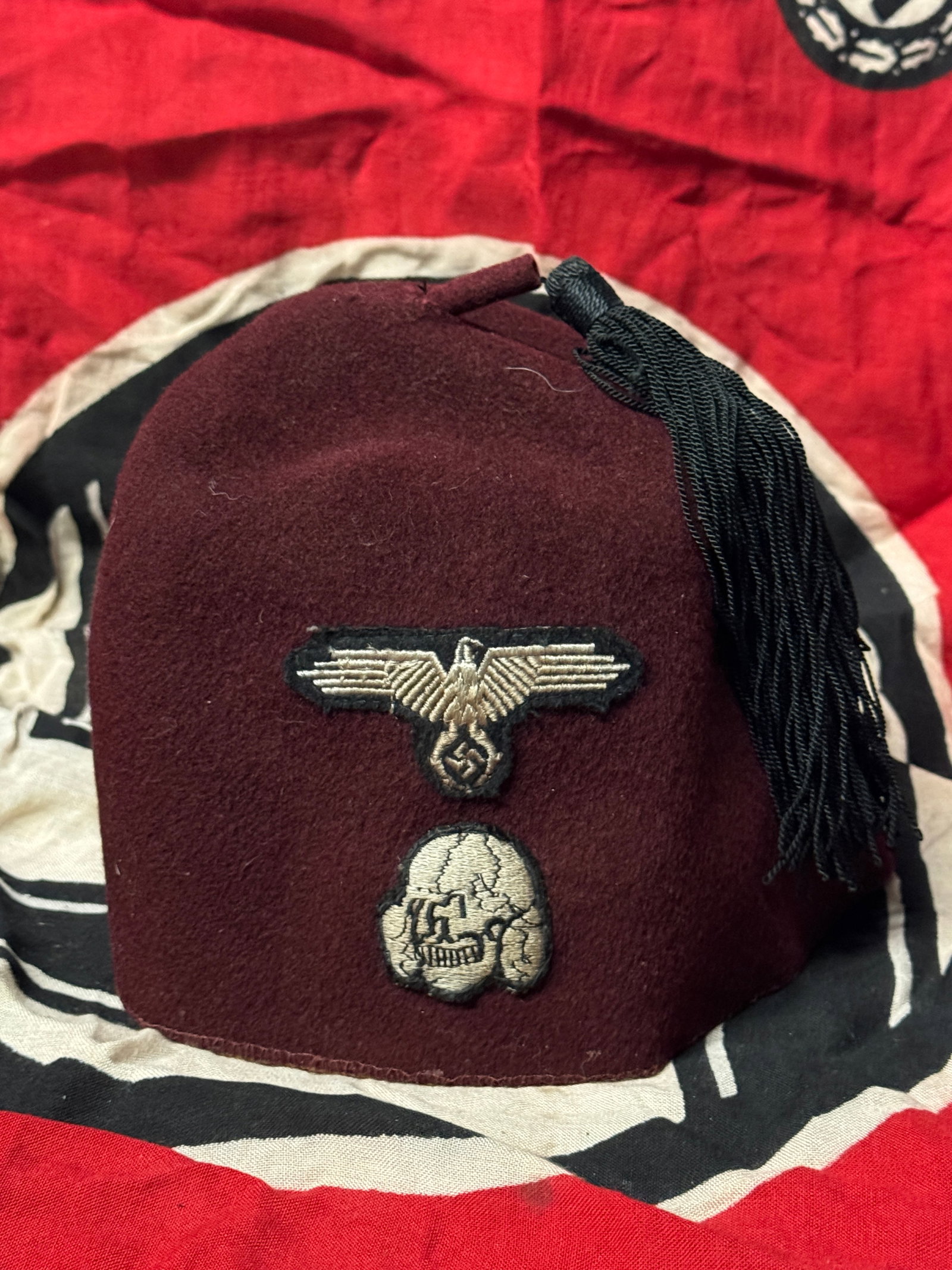 WW2 GERMAN WAFFEN-SS "HANDSCHAR" FEZ HAT CAP: WW2 GERMAN WAFFEN-SS "HANDSCHAR" FEZ HAT CAP. HAS THE MAKER MARKS ON THE INSIDE LEATHER SWEAT BAND. SHOWS GOOD WEAR AND USE WITH A BEAUTIFUL OVERALL PATINA. Waffen-SS "Handschar" fez of the 13th Gebir