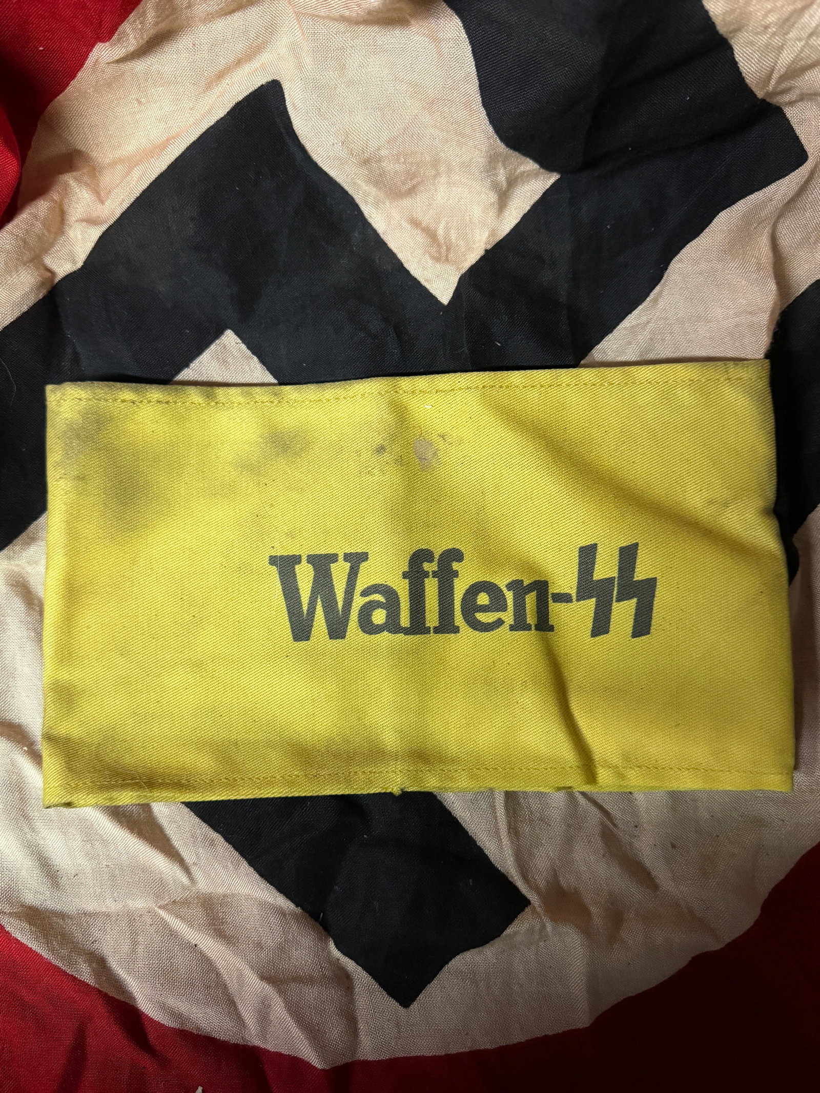 WW2 German Waffen SS Auxilliary Armband With RZM Papertag: WW2 German Waffen SS Auxilliary Armband With RZM Papertag. A VERY RARE FIND. SHOWS GOOD WEAR AND USE WITH A BEAUTIFUL OVERALL PATINA. APPEARS TO BE WELL USED - PLEASE VIEW ALL DETAILED PICTURES. A WEL