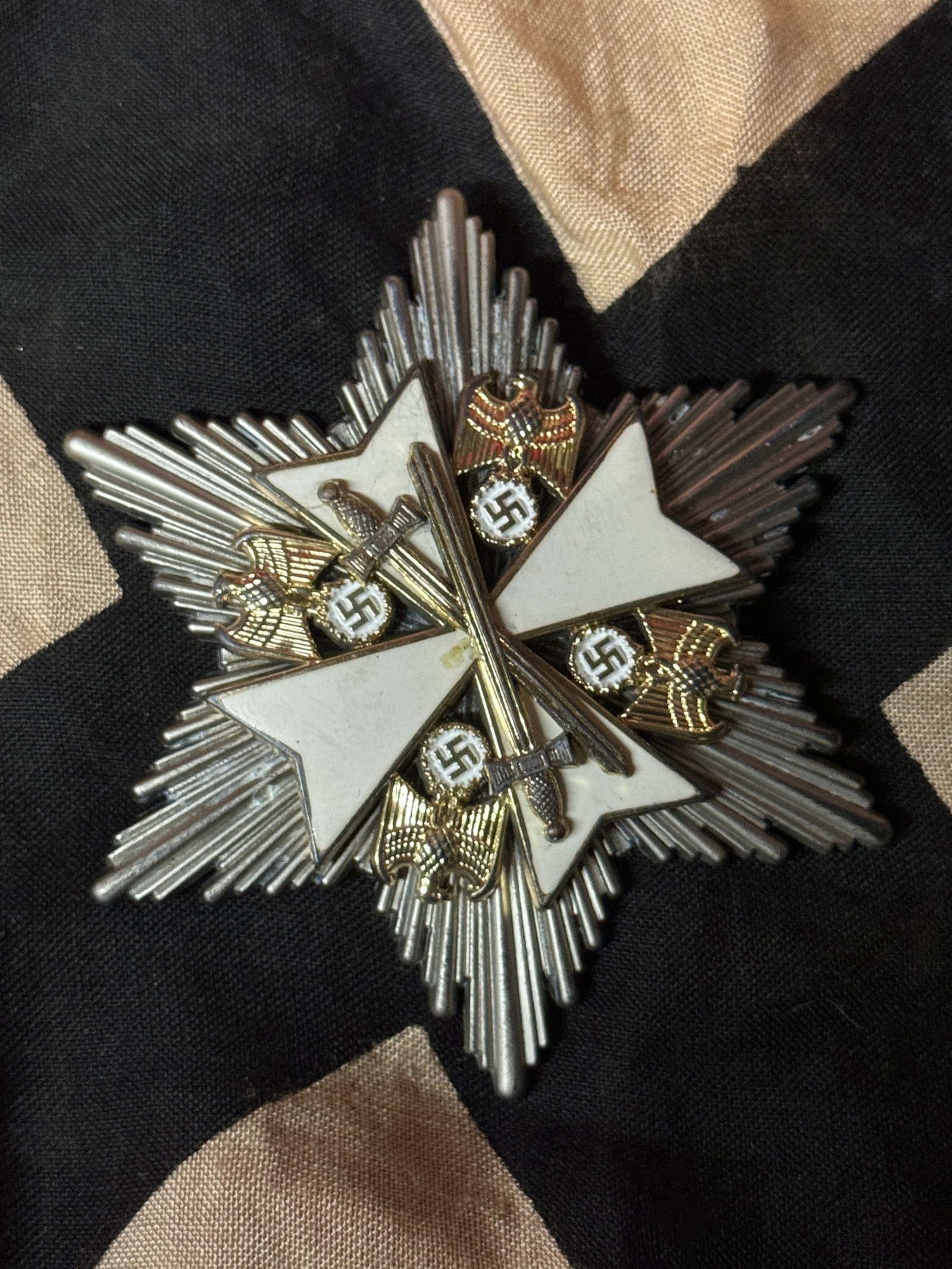 WW2 German Third Reich Star of the German Eagle Order With Serial #: WW2 German Third Reich Star of the German Eagle Order With Serial #. A RARE EXAMPLE. SHOWS GOOD WEAR AND USE WITH A BEAUTIFUL OVERALL PATINA. PLEASE VIEW ALL DETAILED PICTURES. A VERY RARE FIND.