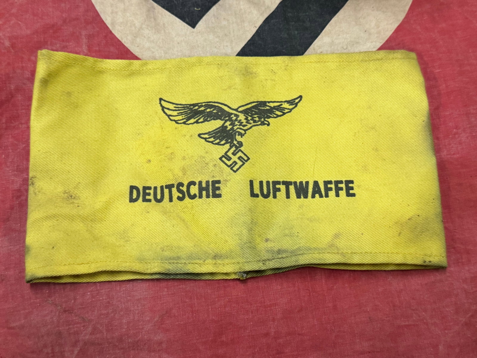 German WWII Early type Deutsche Luftwaffe armband: German WWII Early type Deutsche Luftwaffe armband. A VERY RARE FIND. SHOWS GOOD WEAR AND USE WITH A BEAUTIFUL OVERALL PATINA. PLEASE VIEW ALL DETAILED PICTURES. A WELL MADE ANTIQUE GERMAN ARTIFACT.