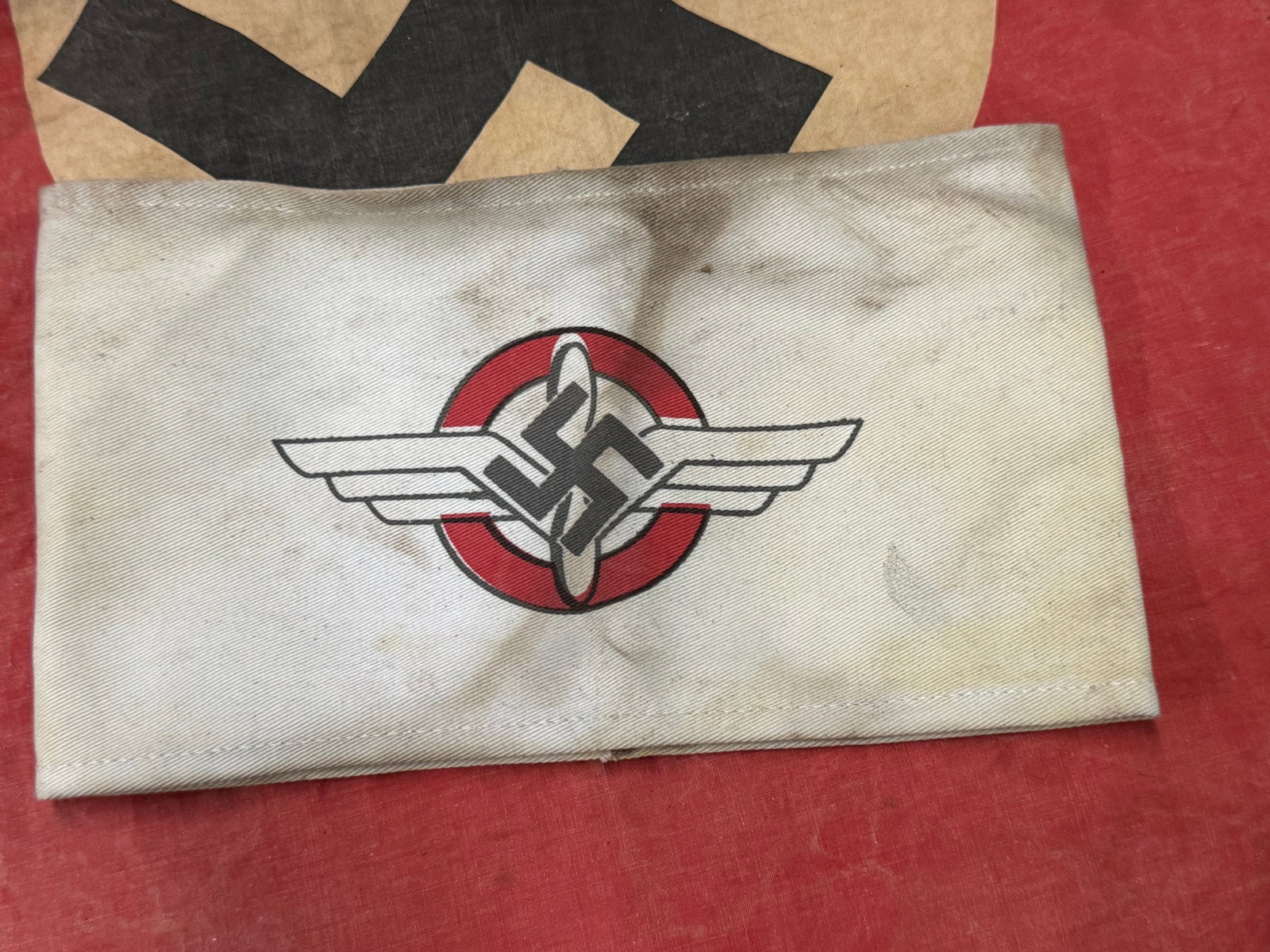 DLV Flyers armband WWII German Pilots: DLV Flyers armband WWII German Pilots. A VERY RARE FIND. SHOWS GOOD WEAR AND USE WITH A BEAUTIFUL OVERALL PATINA. PLEASE VIEW ALL DETAILED PICTURES. A WELL MADE ANTIQUE GERMAN ARTIFACT.