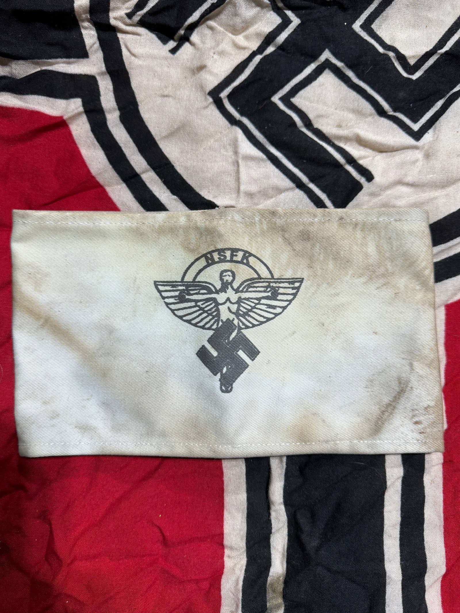 RARE WW2 GERMAN NSFK TUNIC ARMBAND: RARE WW2 GERMAN NSFK TUNIC ARMBAND. A SCARCE EXAMPLE. SHOWS GOOD WEAR AND USE WITH A BEAUTIFUL OVERALL PATINA. PLEASE VIEW ALL DETAILED PICTURES. A WELL MADE ANTIQUE GERMAN ARTIFACT.