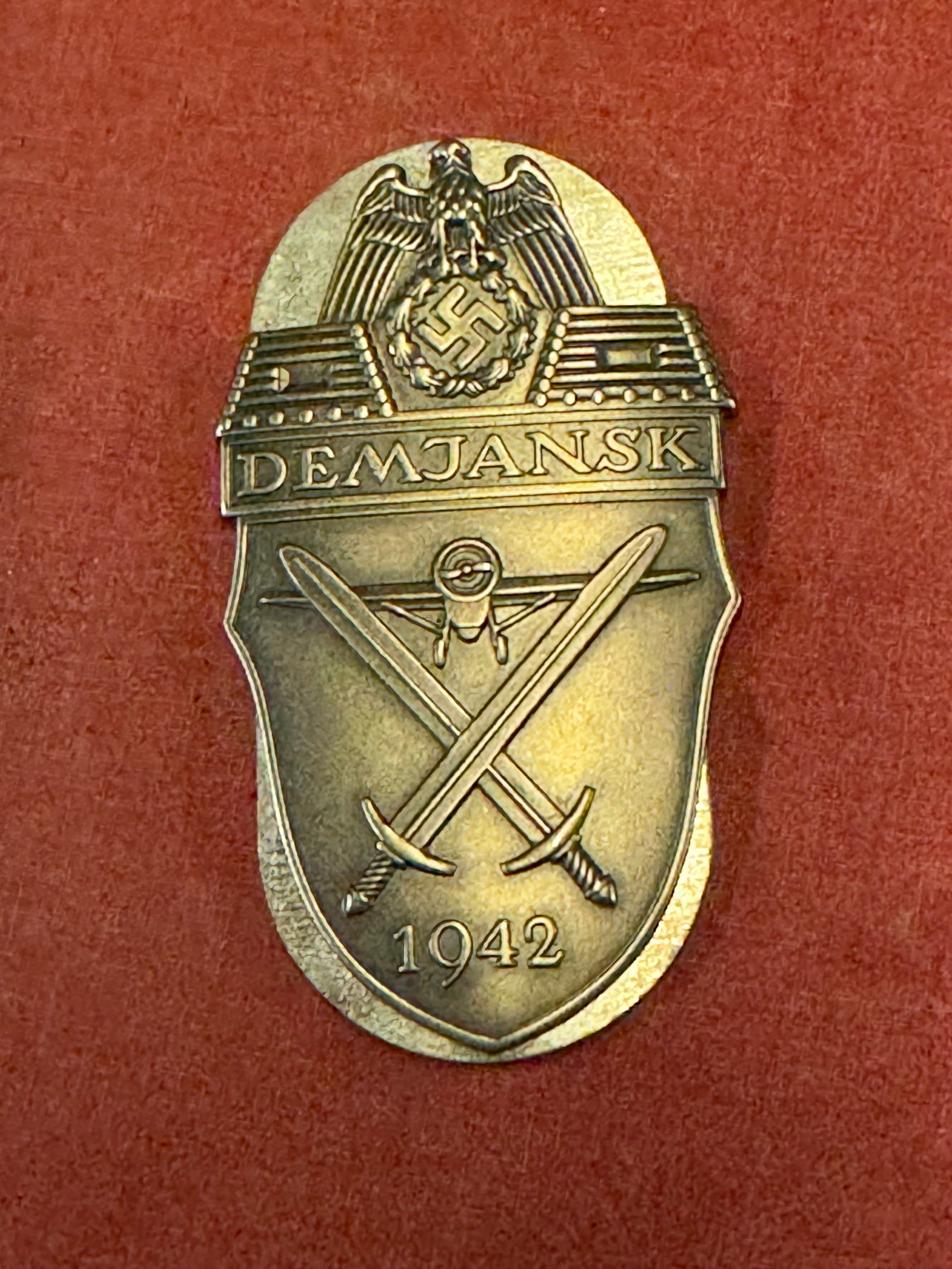 WW2 GERMAN DAMJANSK SHIELD BADGE: WW2 GERMAN DAMJANSK SHIELD BADGE. A SCARCE FIND. SHOWS GOOD WEAR AND USE WITH A BEAUTIFUL OVERALL PATINA. PLEASE VIEW ALL DETAILED PICTURES. A SCARCE EXAMPLE.